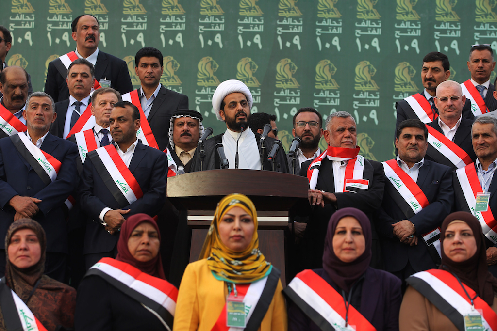 Qais al-Khazali (C) leader of the Asa'ib Ahl al-Haq, gives a speech during a campaign rally for the Fatah Alliance (AFP)