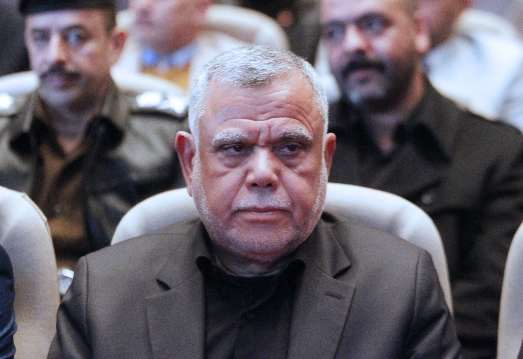 Hadi al-Ameri, head of Iraq's Badr organisation and a leader of the mostly Shiite Hashed al-Shaabi paramilitary units, attends a memorial service held in Baghdad's high-security Green Zone (AFP)