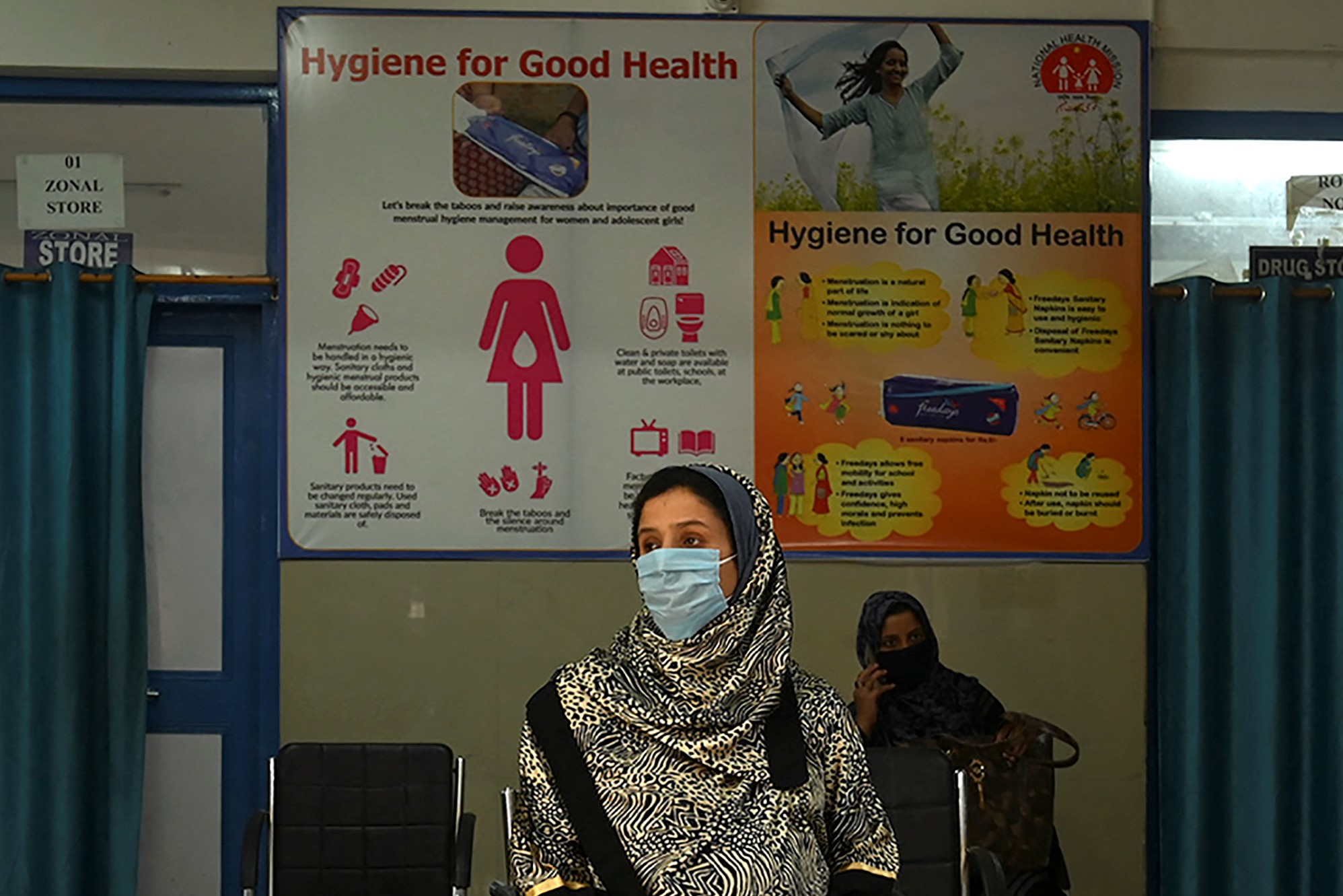 Pregnant women maintain social distancing wait for their turn at a COVID-19 coronavirus testing centre during a government-imposed nationwide lockdown as a preventive measure against the COVID-19 coronavirus, in Srinagar on May 9, 2020