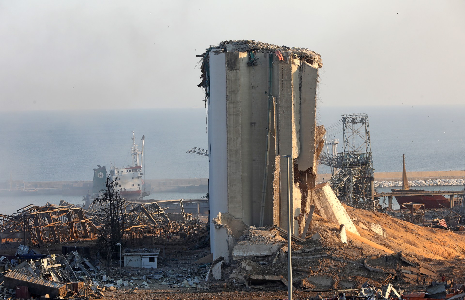 A destroyed silo is seen amid the rubble and debris following yesterday's blast at the port (AFP)