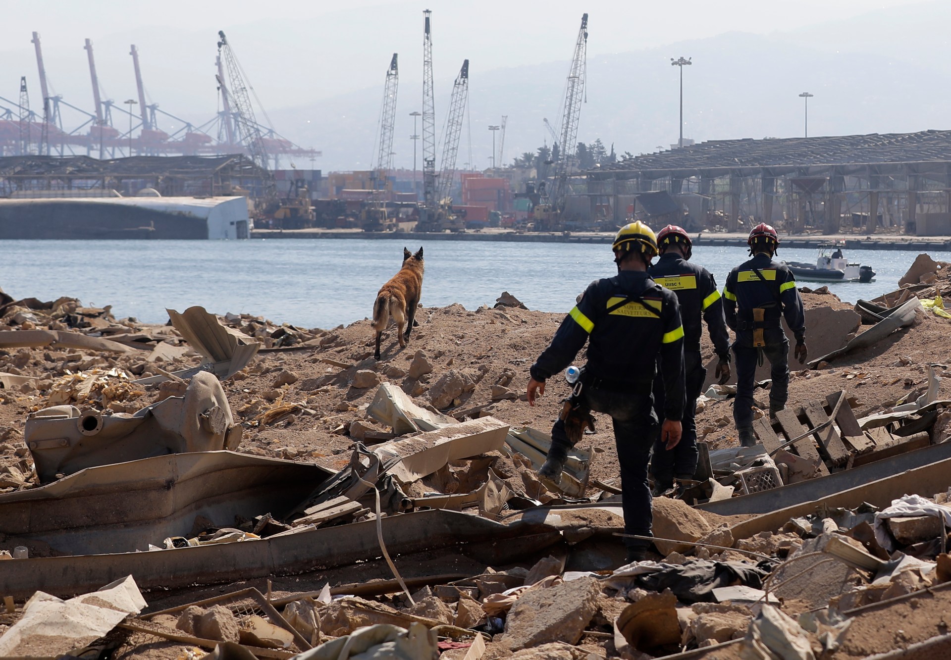 French rescuers search the Beirut port on 7 August, three days after a massive blast there shook the Lebanese capital (AFP)