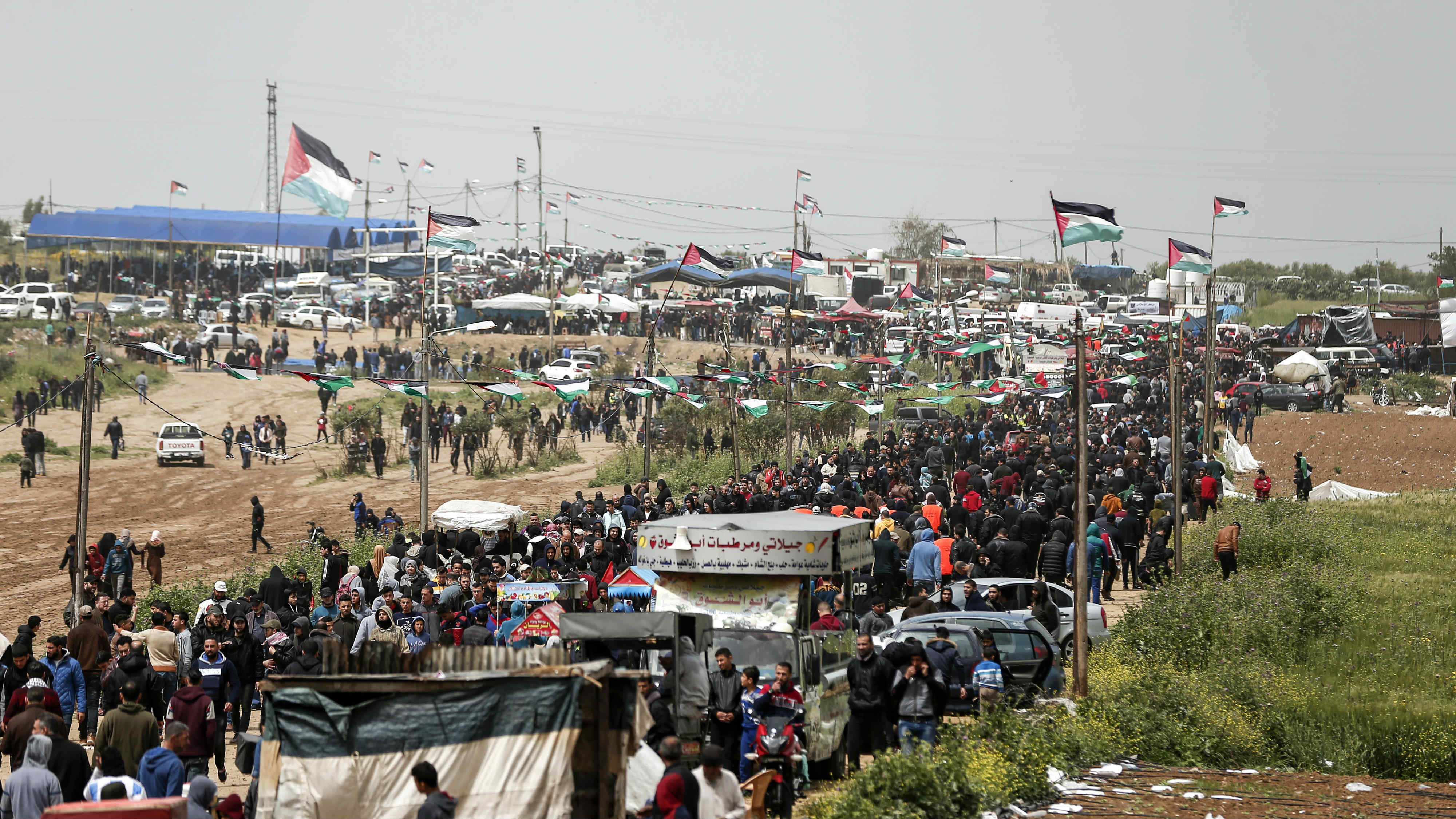 Palestinians gather during a demonstration near the frontier with Israel in Malaka east of Gaza City (AFP)