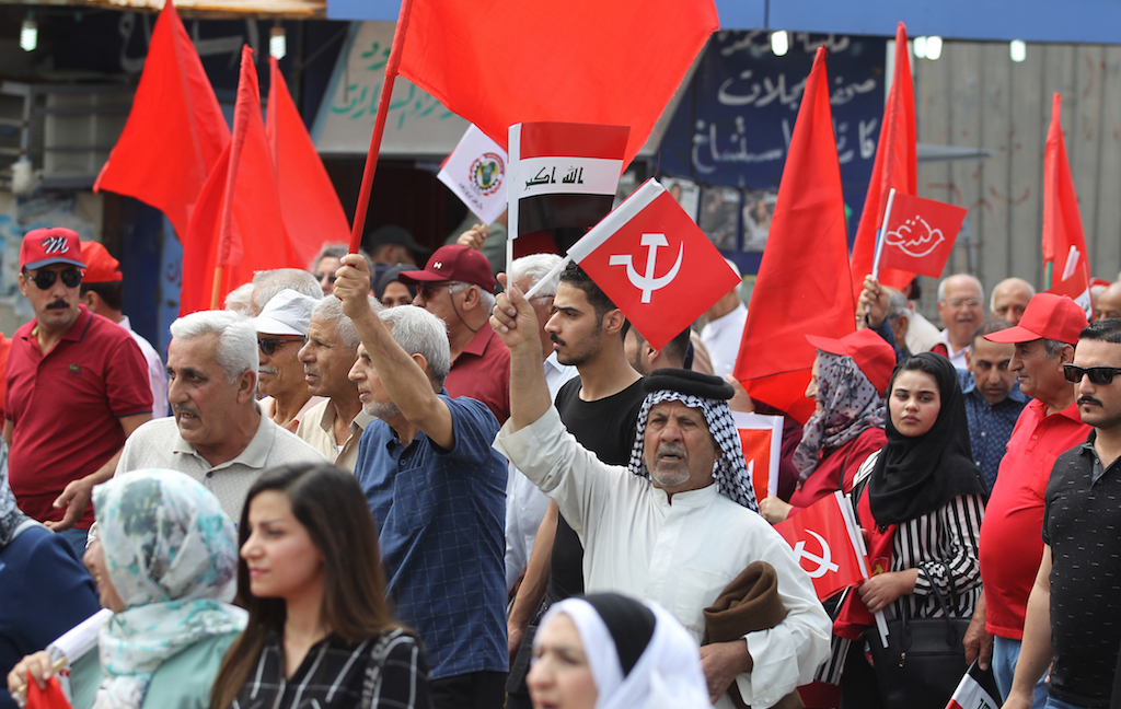Supporters of the Iraqi Communist Party take part in a rally marking Labour Day in the capital Baghdad