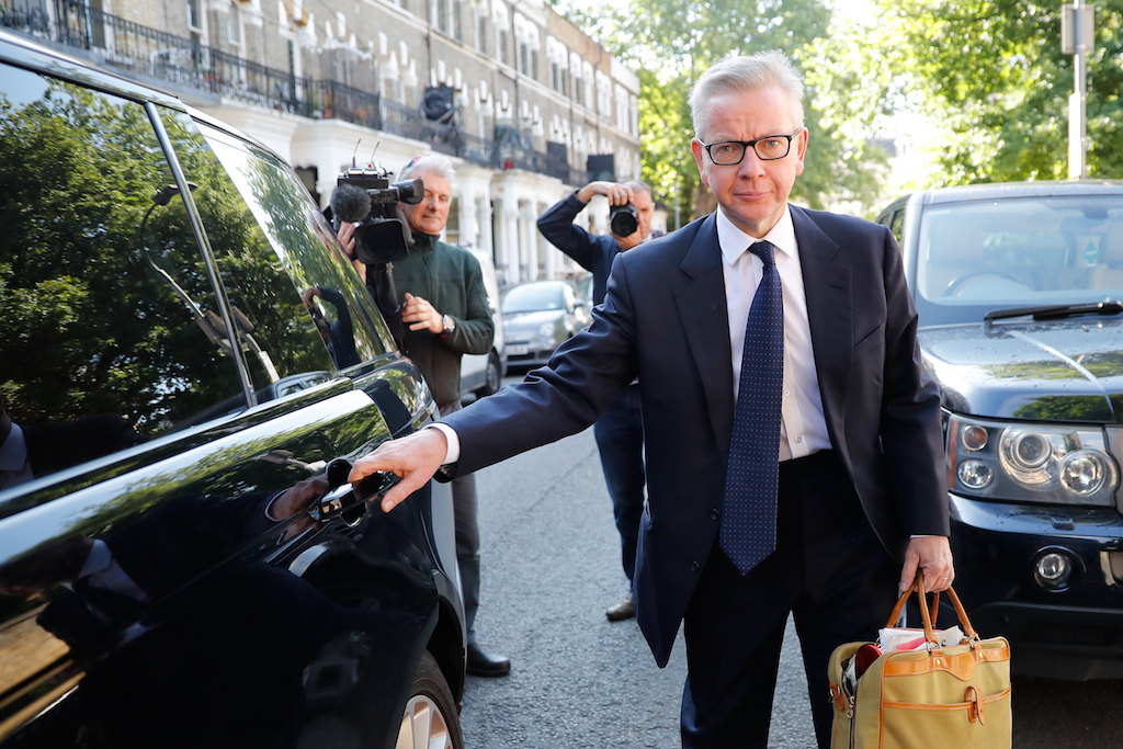Michael Gove leaves his home in London (AFP)