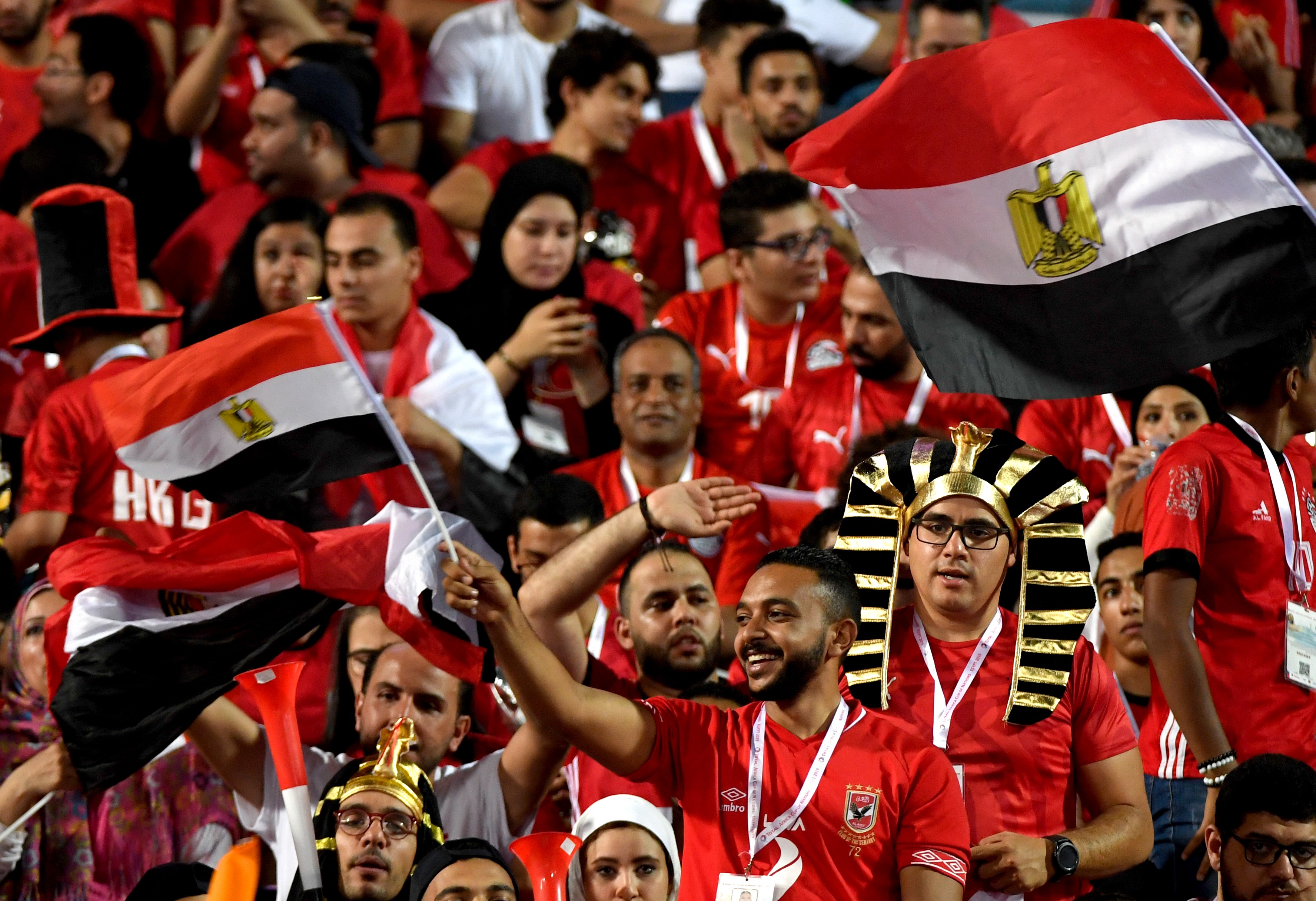  Egypt's fans cheer for their team prior to the 2019 Africa Cup of Nations (CAN) football match between Egypt and DR Congo at the Cairo International Stadium on 26 June (AFP)