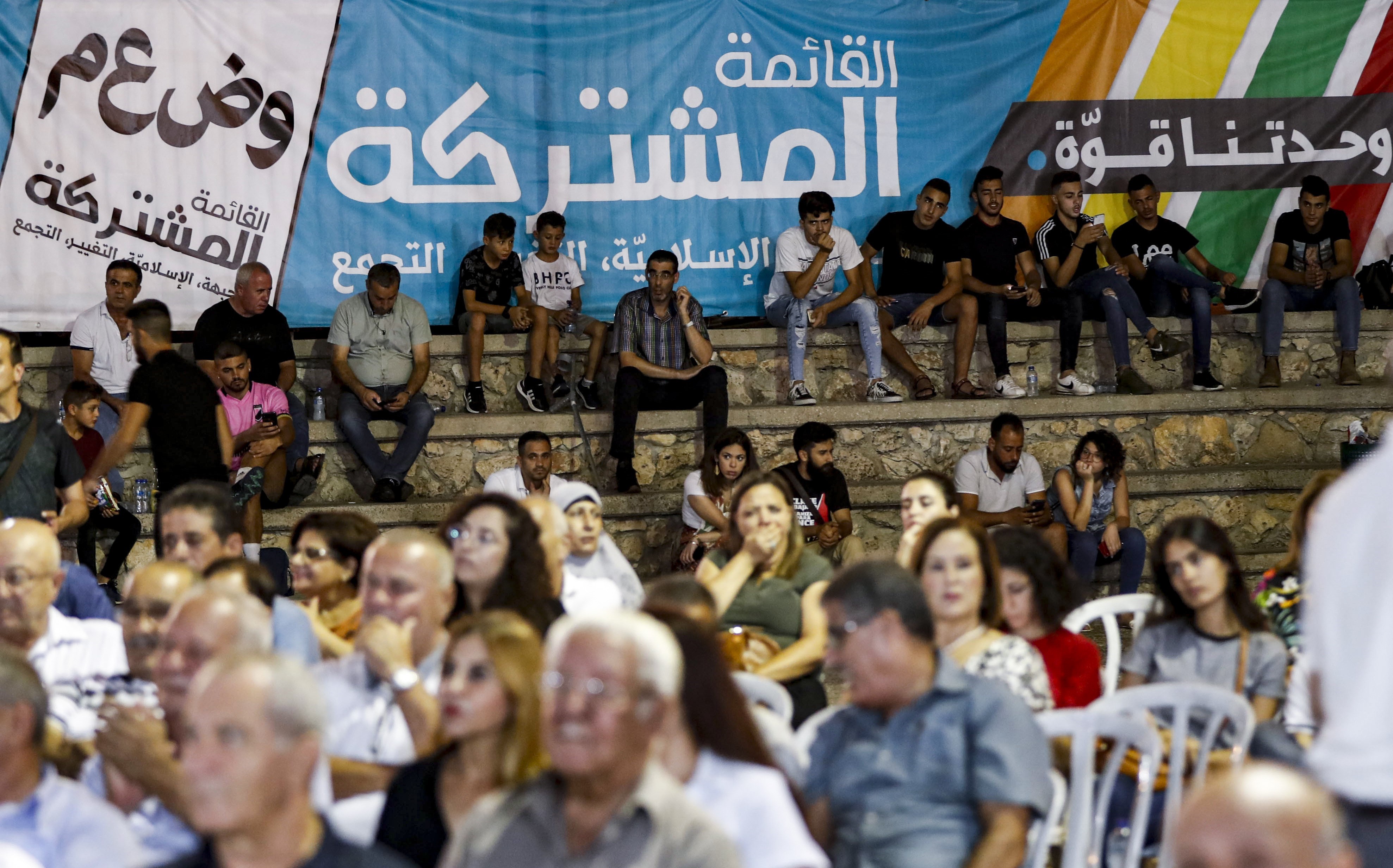  Supporters of the Joint List Israeli Arab political alliance attend a campaign rally ahead of upcoming September parliamentary elections, in the Arab town of Kafr Yasif in northern Israel on 23 August (AFP)