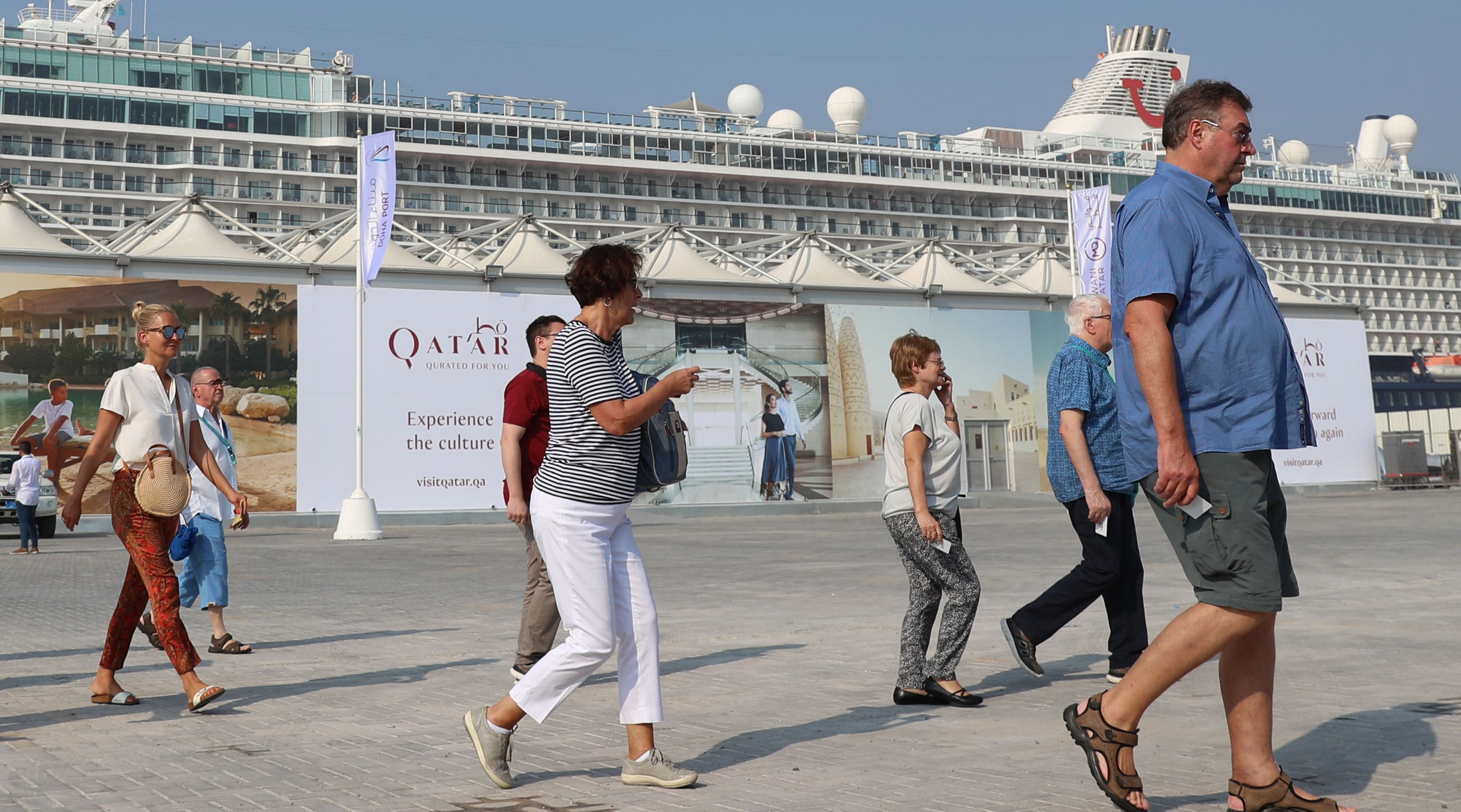  Tourists disembark at Doha Port as a new cruise season kicks off in Doha on 22 October (AFP)