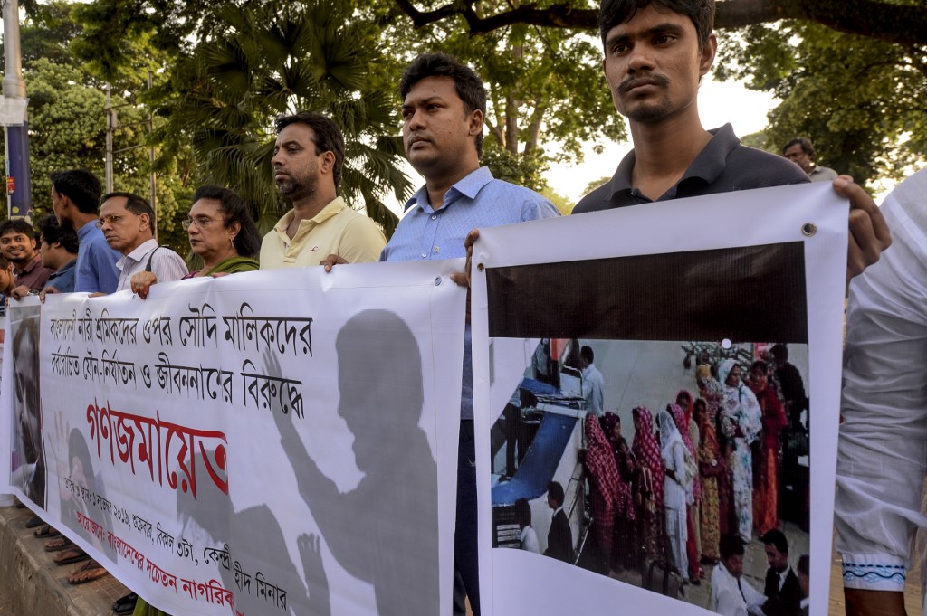 Social activists in Dhaka protest against abuse of female migrant workers inside Saudi Arabia (AFP)