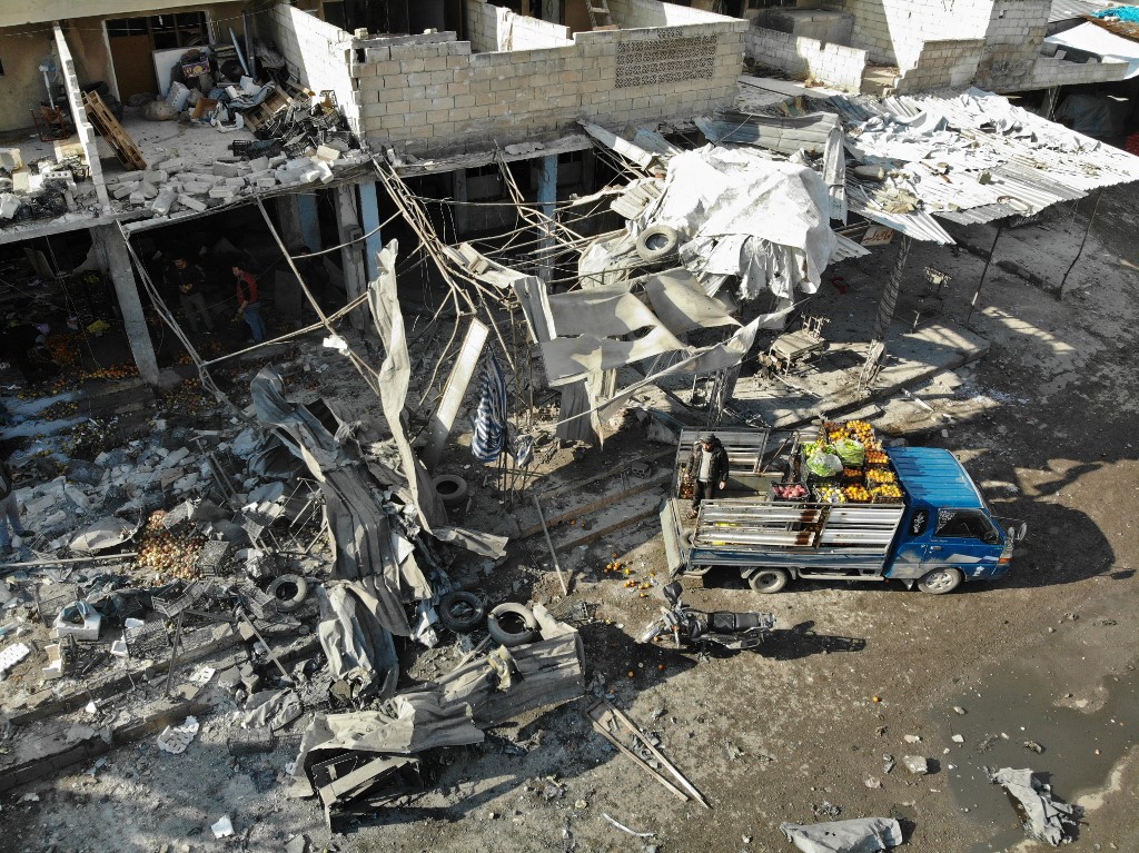 Aerial view shows market in Maarat al Numan devastated from the air strikes (AFP)