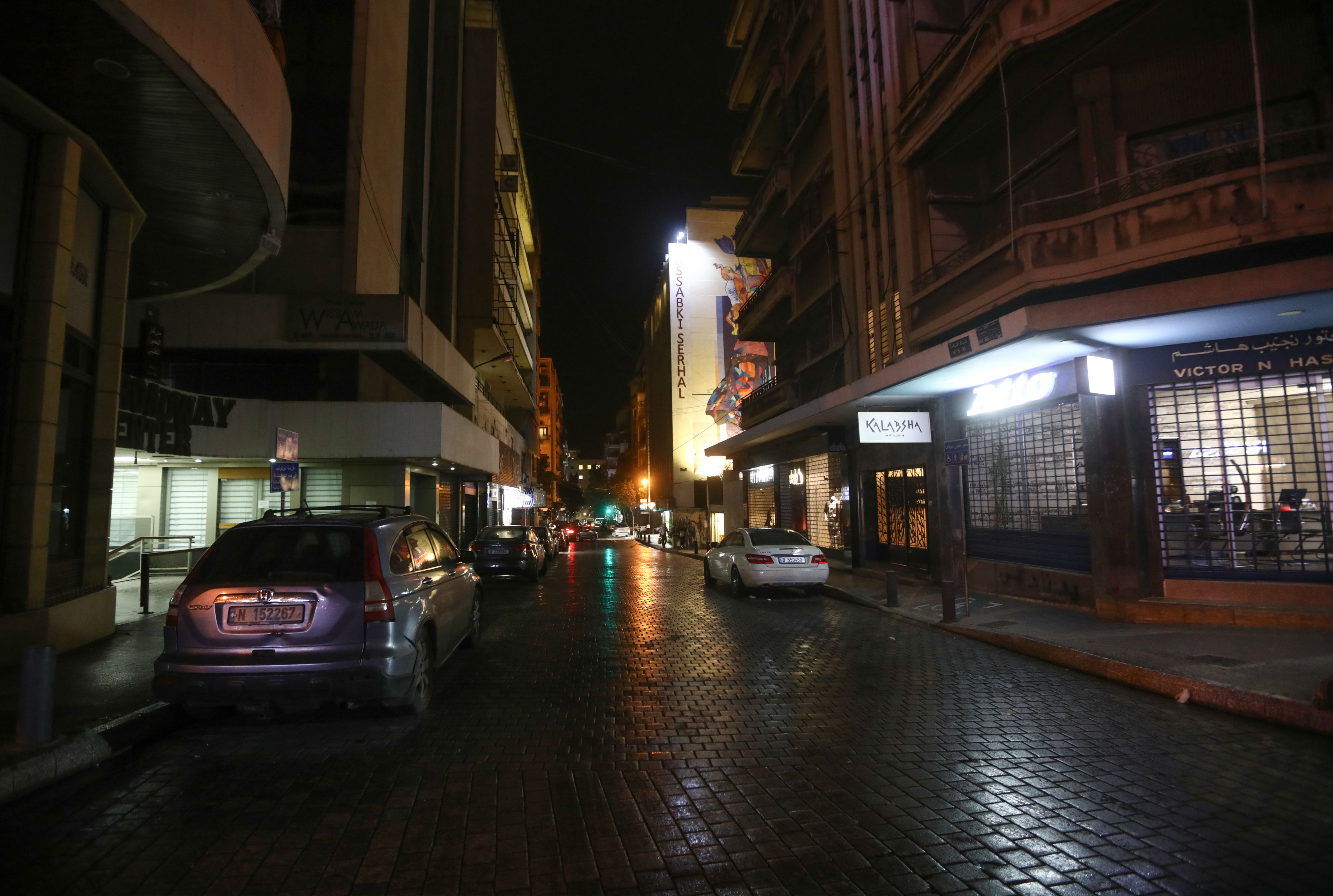 Hamra street in the Lebanese capital Beirut, known for its bustling nightlife, empty, after measures were taken in order to prevent the spread of the coronavirus (AFP)