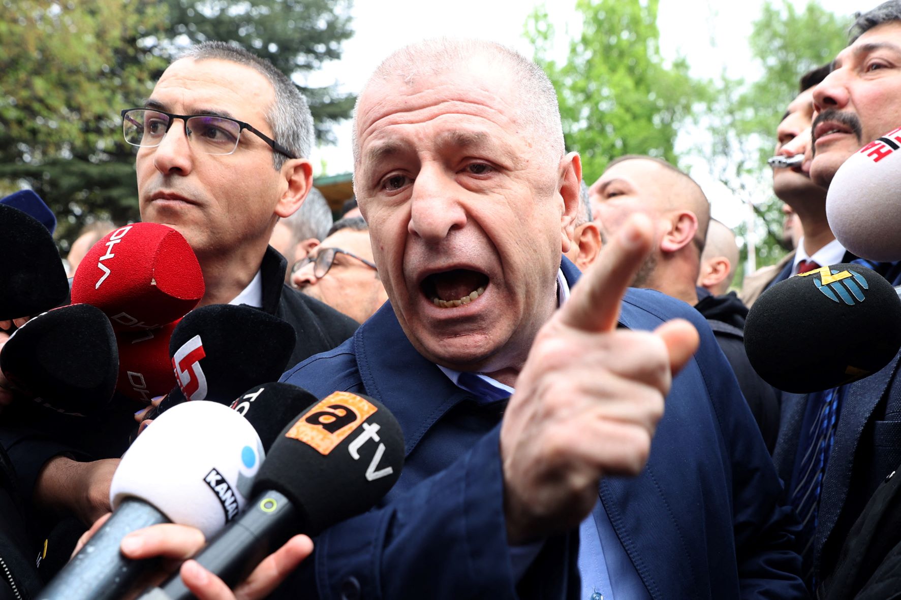 Umit Ozdag, the leader of recently formed Turkish nationalist Victory Party (ZP) or Zafer Partisi, gestures as he speaks to the media (AFP)