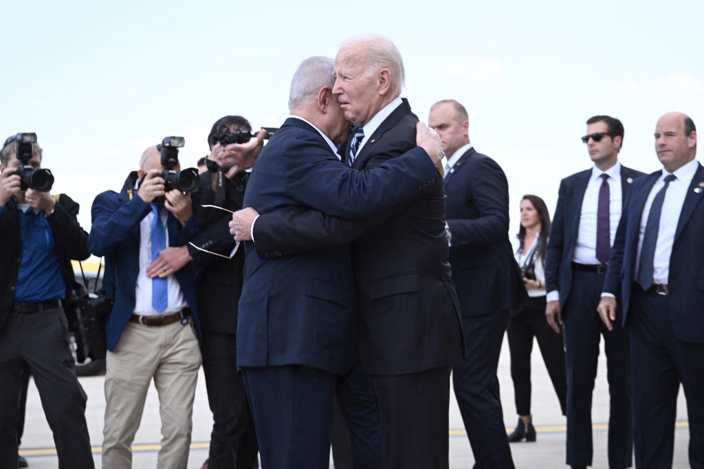sraeli Prime Minister Benjamin Netanyahu (L) greets US President Joe Biden at Tel Aviv's Ben Gurion airport on 18 October 2023 (Brendan Smialowski/AFP)