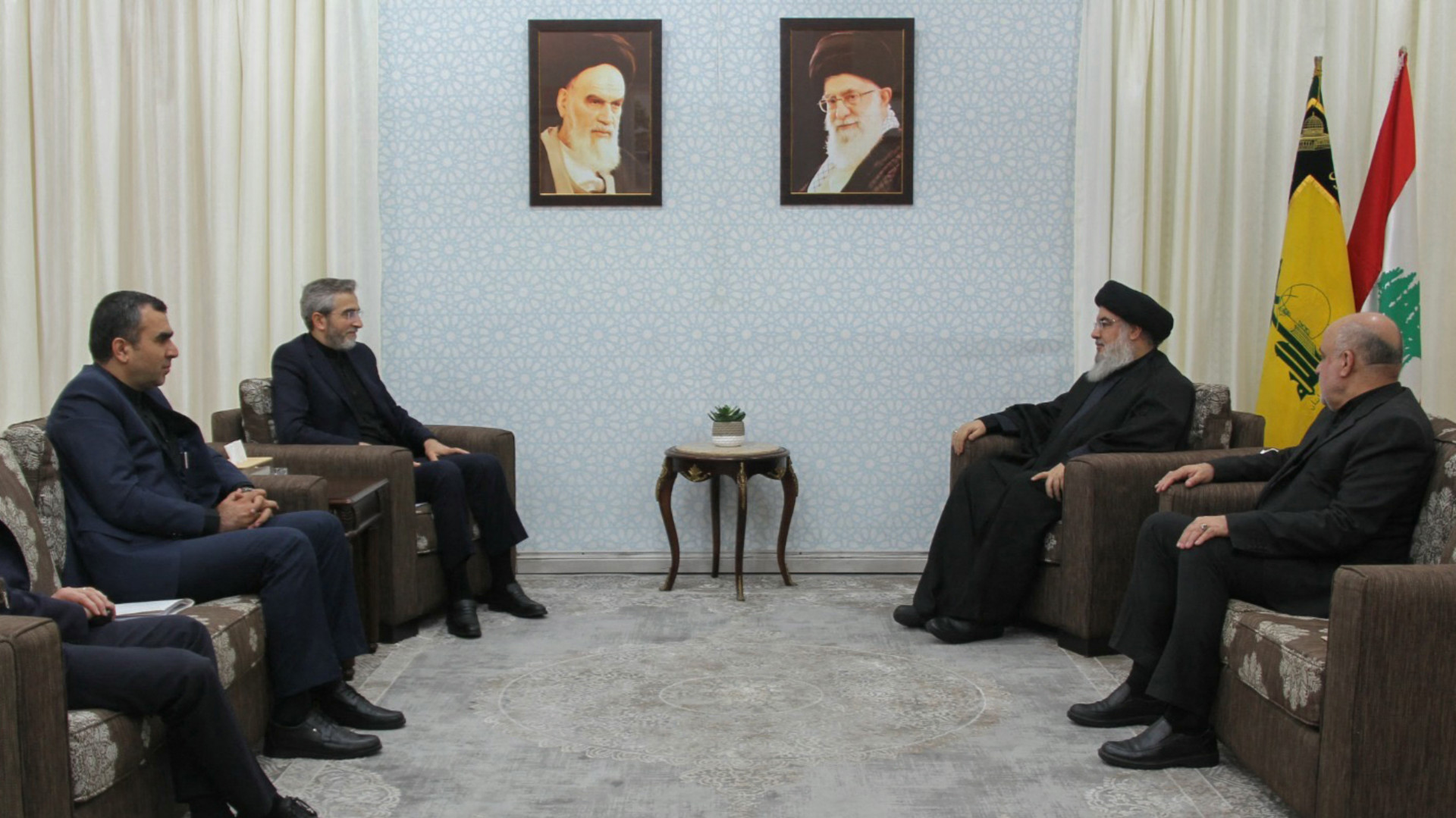 A handout picture released by Hezbollah press office on 4 June 2024 shows group's leader Hassan Nasrallah (2R) meeting with Iran’s acting Foreign Affairs Minister Ali Bagheri (2L) (Hezbollah via AFP)