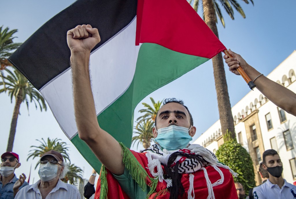 Moroccans denounce the Israeli normalisation deals with the UAE and Bahrain in Rabat on 18 September (AFP)