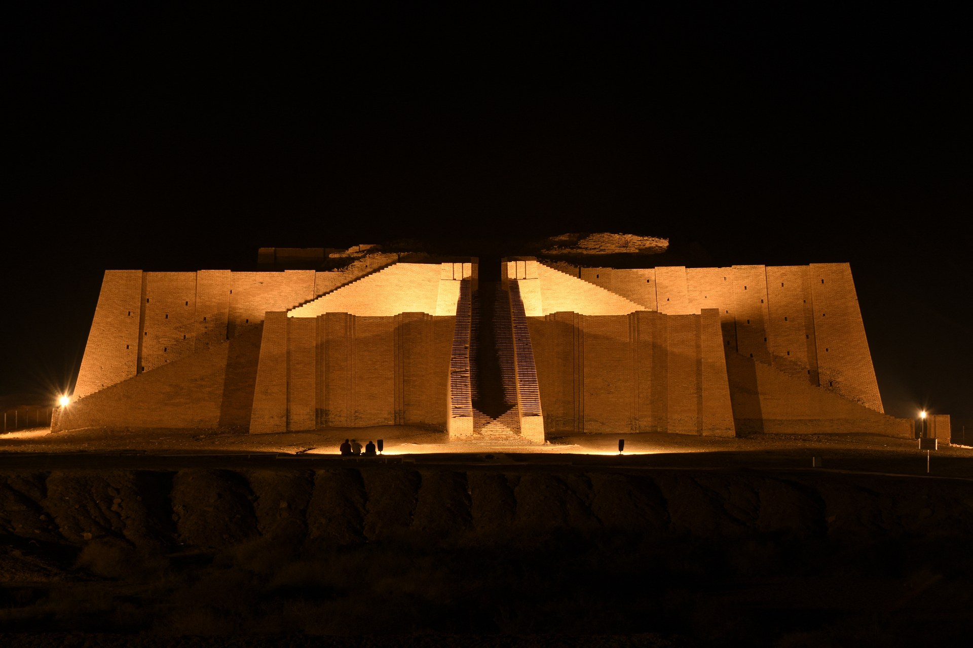 The Great Ziggurat temple in the ancient city of Ur is illuminated, ahead of the visit of Pope Francis to Iraq, in the southern province of Dhi Qar (AFP)
