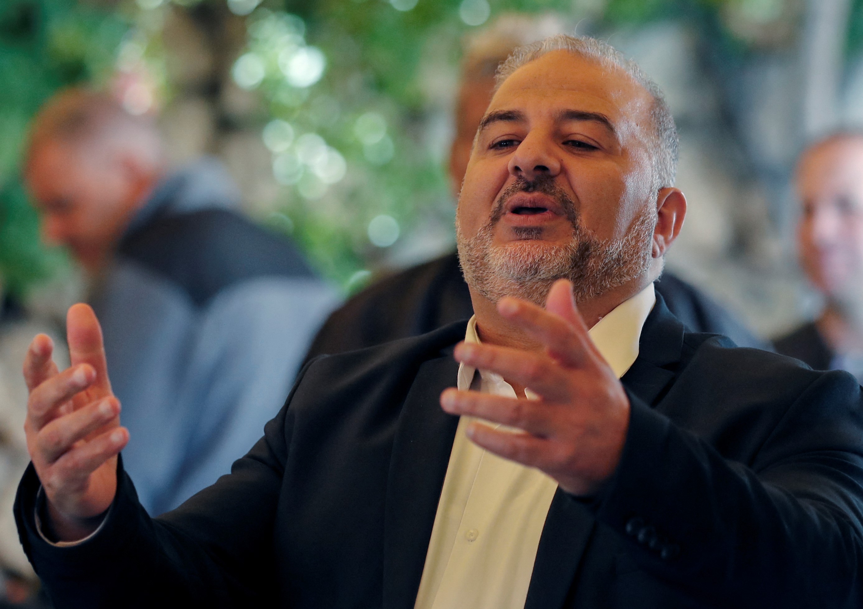 Mansour Abbas, head of the conservative Islamic Raam party, speaks to a crowd during a political gathering to congratulate him on the electoral victory in the northern Israeli village of Maghar on March 26, 2021