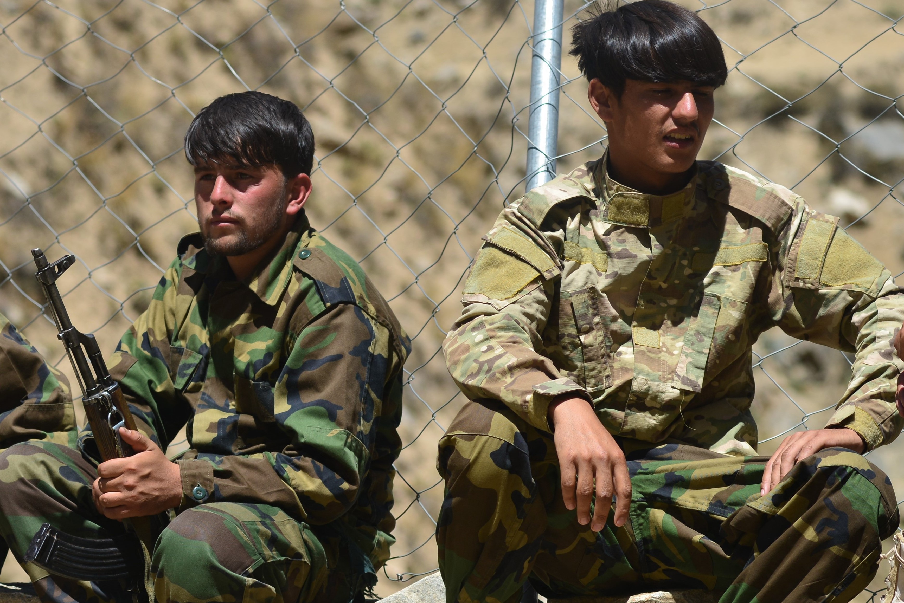Afghan resistance movement and anti-Taliban uprising forces rest during military training at the Abdullah Khil area of Dara district in Panjshir province on August 24, 2021