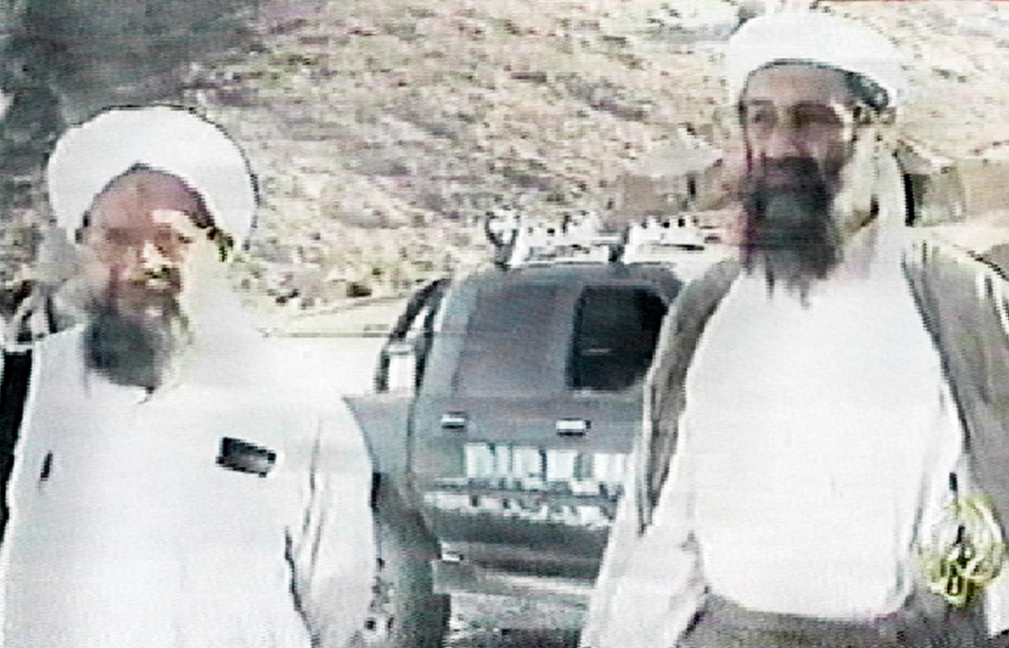 A TV grab from footage aired by the Doha-based al-Jazeera channel late 04 October 2001 shows Osama bin Laden (R) with Ayman al-Zawahiri in Afghanistan (AFP)