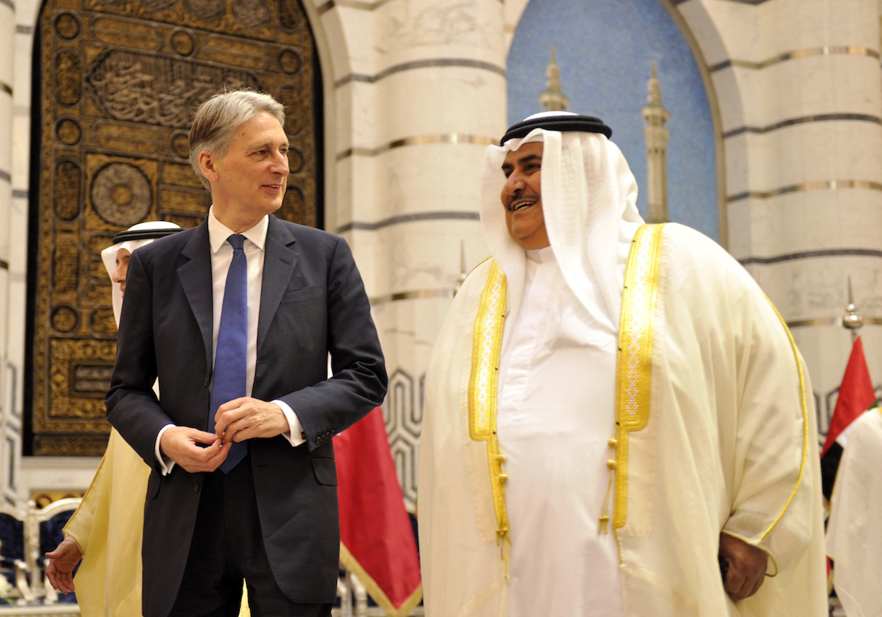 Britain's then Foreign Secretary Philip Hammond (L) speaks with Bahrain's Foreign Minister Khalid bin Ahmed al-Khalifa in Jeddah (AFP) in 2016