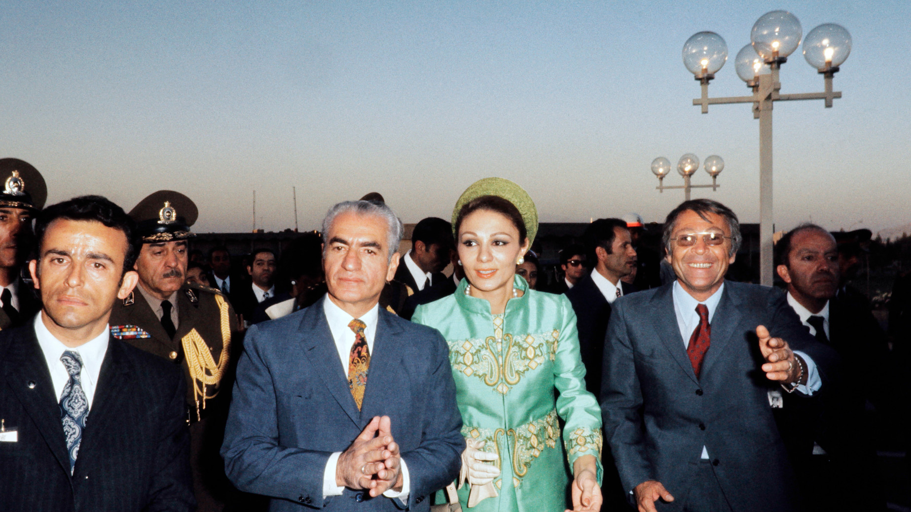 Photo from October 1971 shows then-Shah Mohammad Reza Palhavi and his wife, Iranian Empress Farah Diba, arriving at a commemoration of the 2500th anniversary of the Persian empire in Persepolis. (AFP)