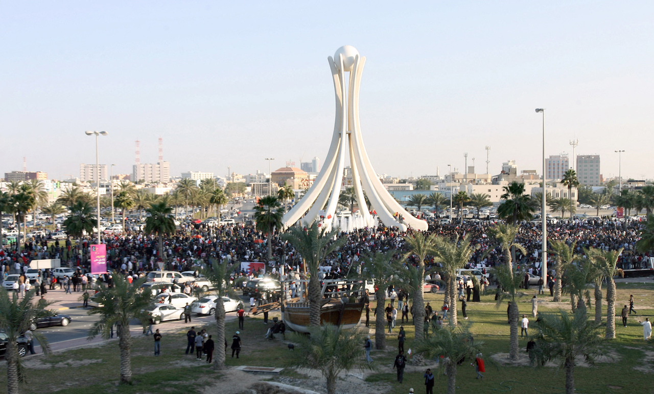 Thousands of anti-government protesters gather at Bahrain's Pearl roundabout in the capital Manama, on 15 February 2011 (AFP)