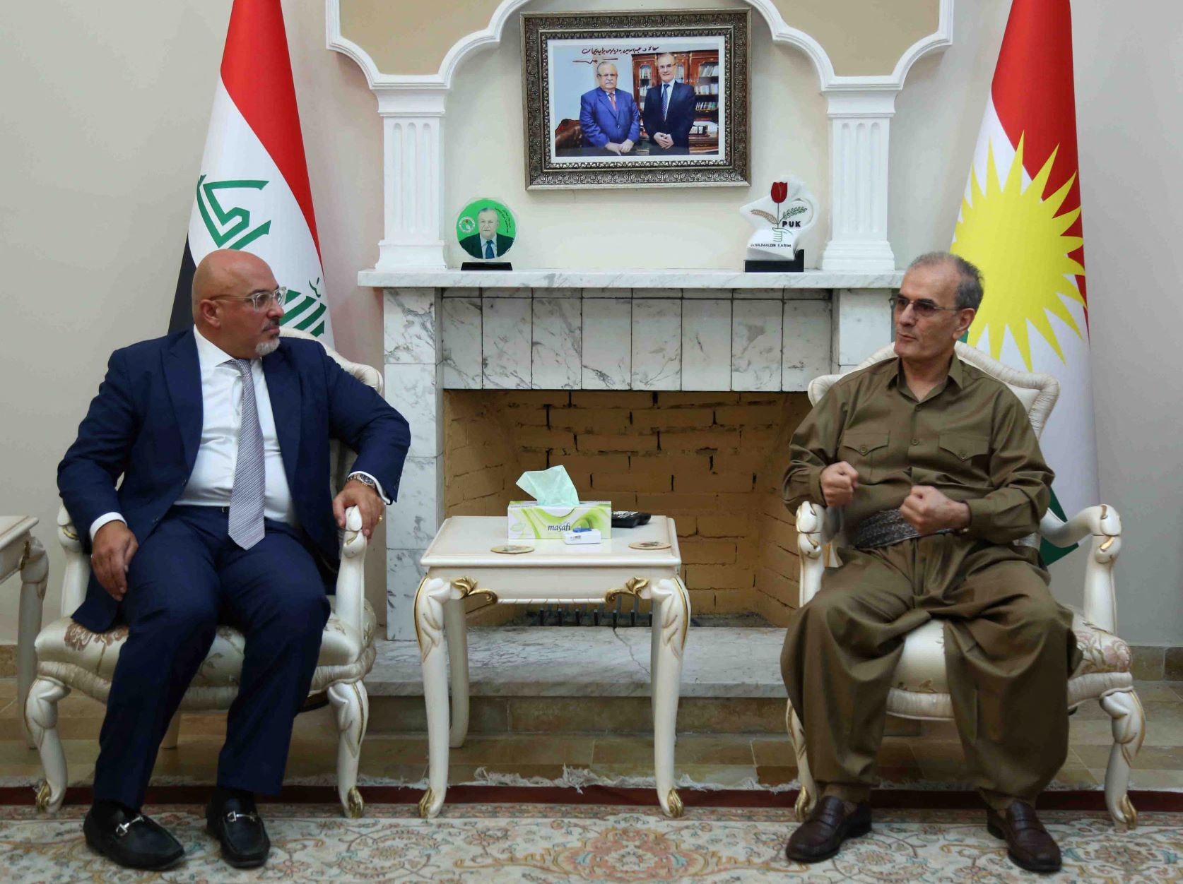 Nadhim Zahawi meets with Kirkuk provincial Governor Najim al-Din Karim in Kirkuk as Iraqi Kurds vote in the Kurdish independence referendum in 2017 (AFP)