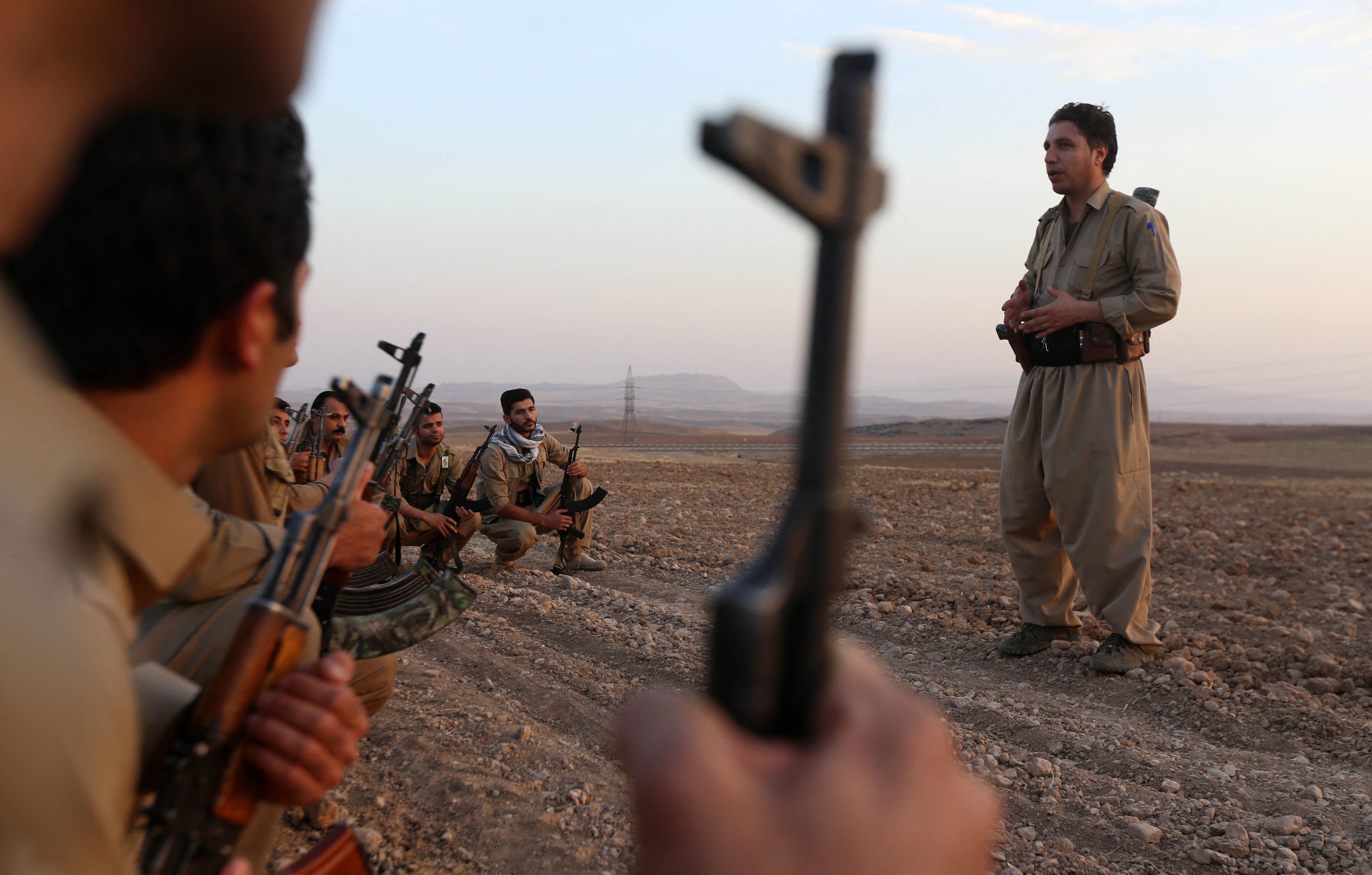 Iranian Kurdish Peshmerga, members of the Iranian Kurdistan Democratic Party (KDP-Iran), take part in routine military exercise in Koya, 100 kms east of Erbil in KRG (AFP)