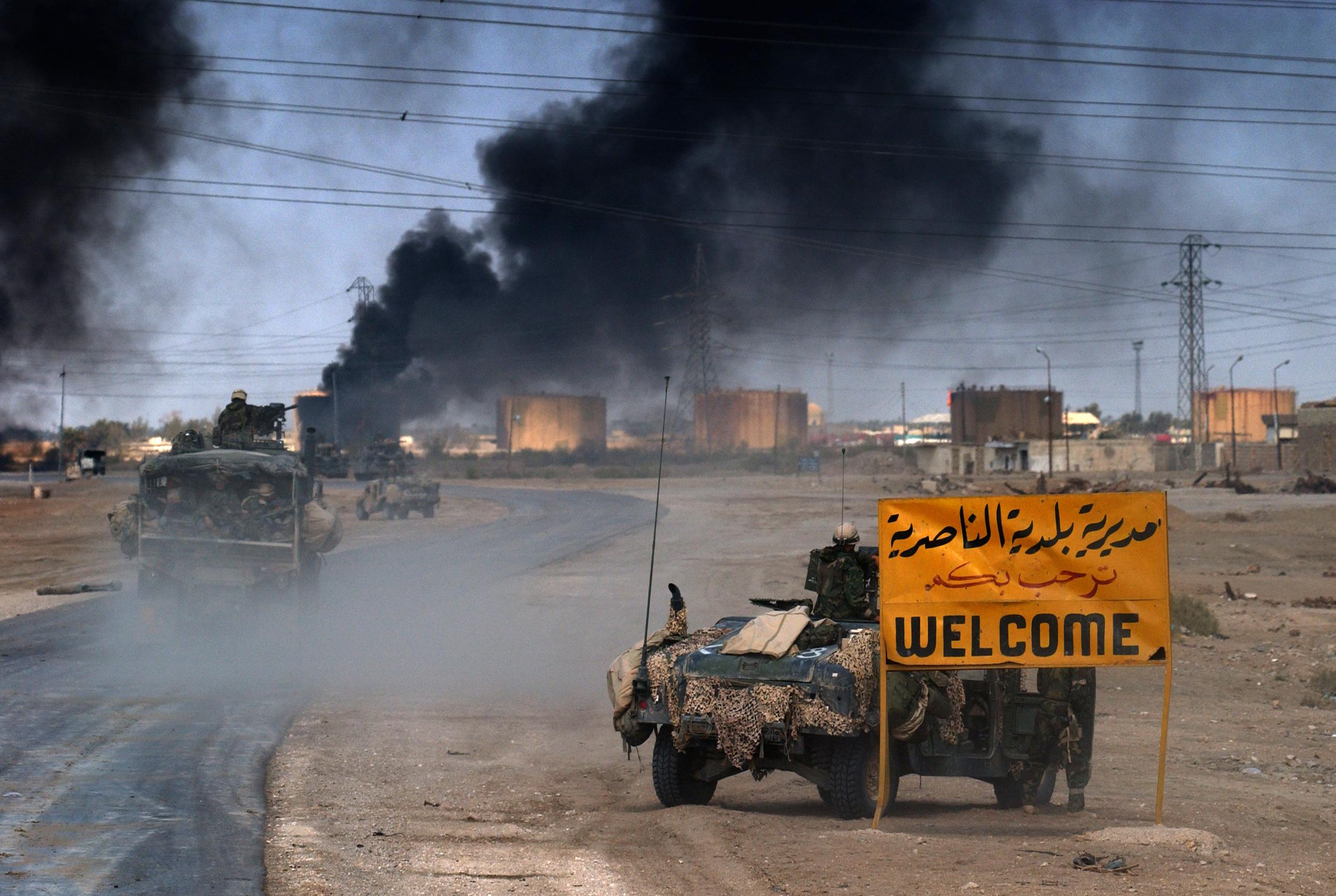 US Marines from the 2nd Battalion 8th regiment enter in the southern Iraqi city of Nasiriyah, where allied troops found stuborn resistance in their northbound advance torwards Baghdad (AFP)