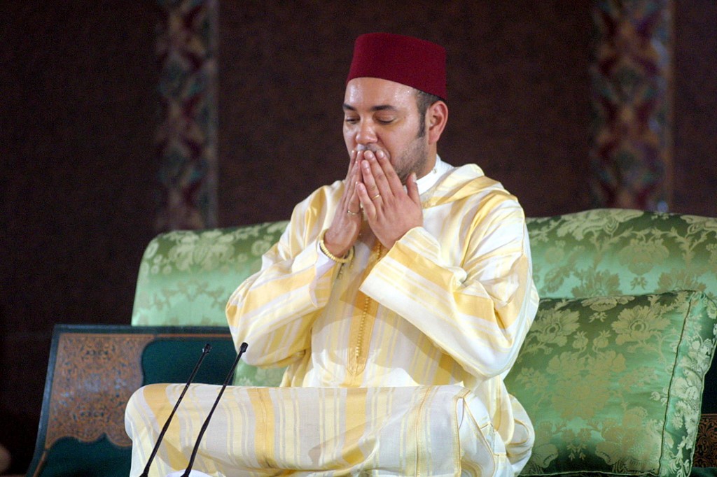King Mohammed VI prays in Casablanca in 2003 (AFP)