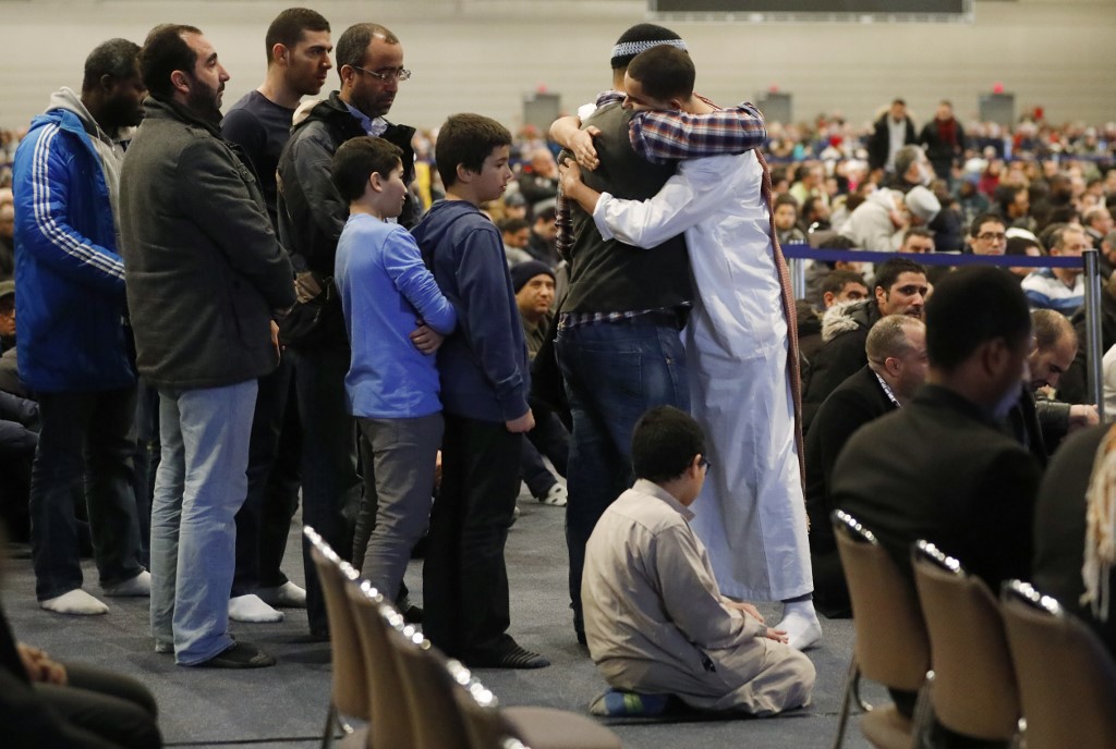 Funeral services are held for victims of the 2017 Quebec mosque shooting (AFP)