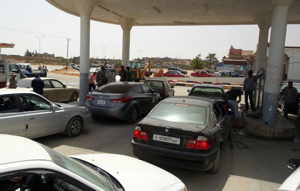 Fuel shortages back in 2014 sent Libyans in the al-Khums district, 110km east of Tripoli, queuing (AFP)