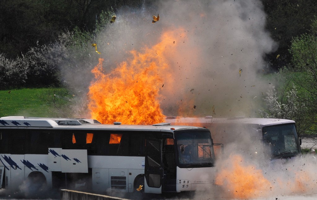 Buses explode as Albanian investigators reenact 2012 July bombing in Burgas to try to piece together what happened (AFP) 