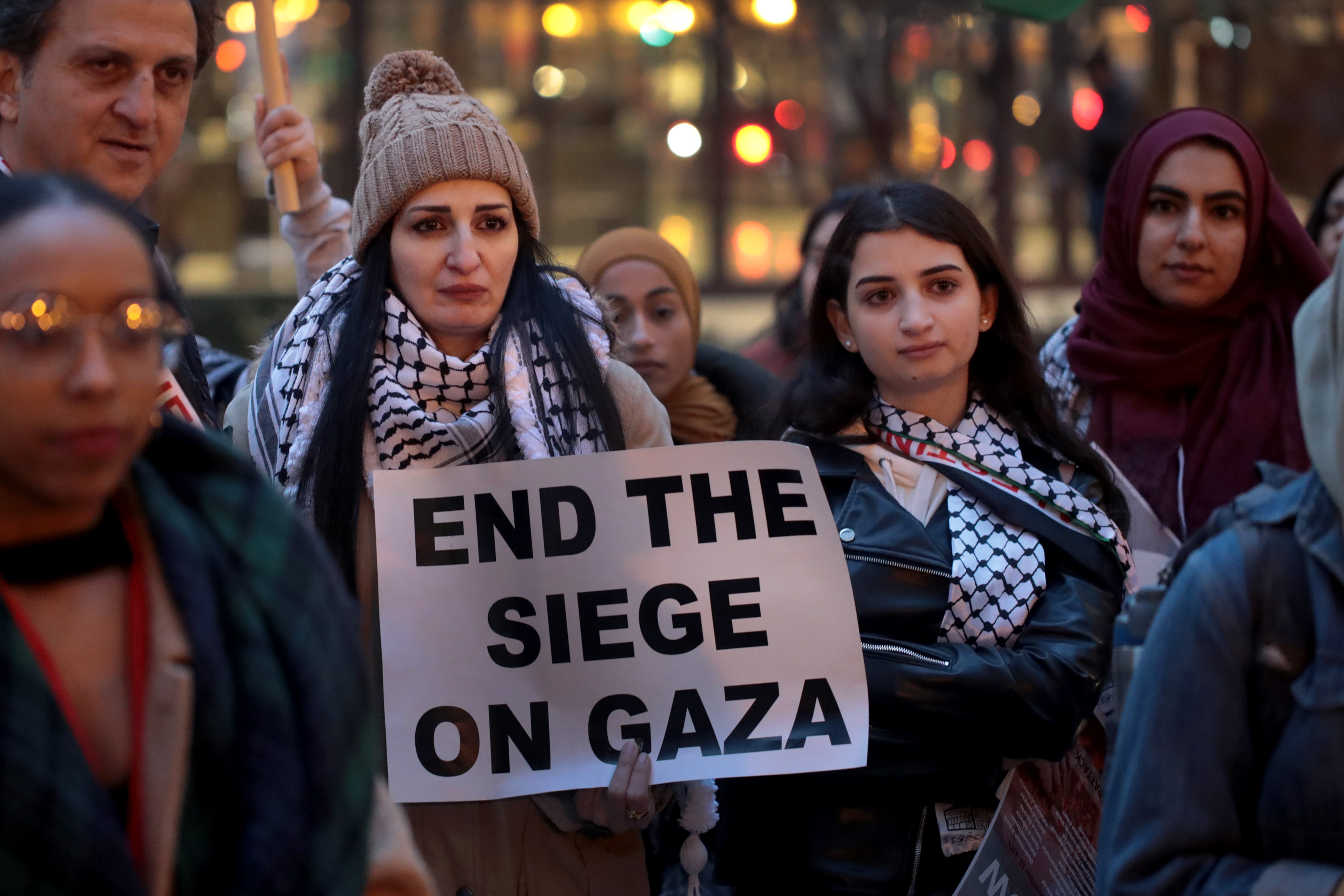 Demonstrators in the Federal Building Plaza protest the deaths of more than 30 Palestinians killed by Israeli air strikes in Gaza on 20 November (AFP)