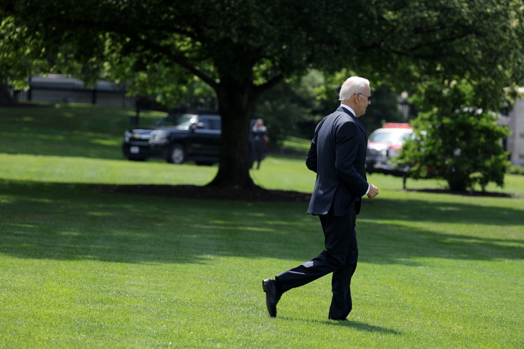 US President Joe Biden jogs towards the Marine One prior to a departure from the White House on 17 June 2022 in Washington, DC. (AFP)