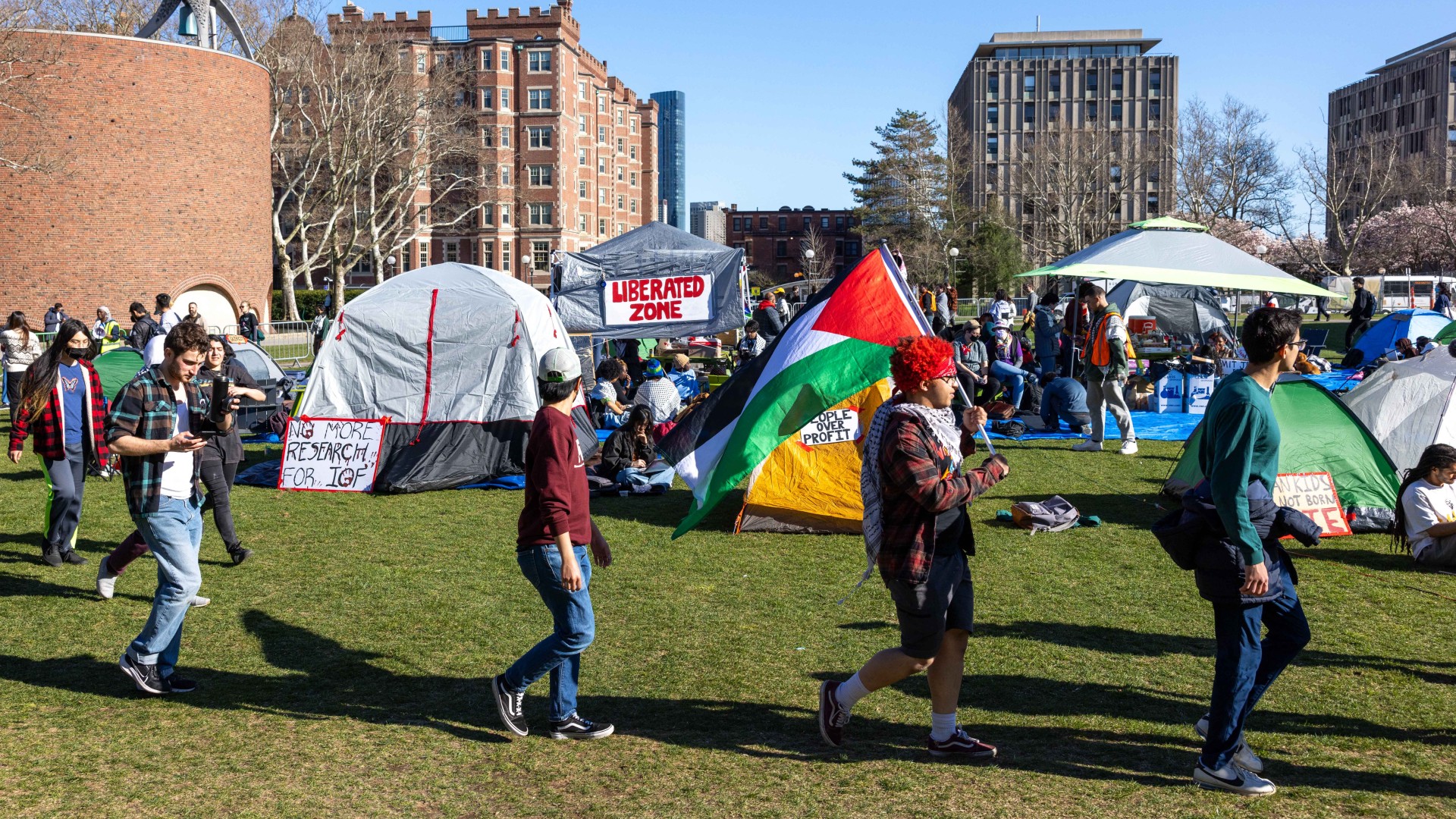  APRIL 22: Students from Massachusetts of Technology, Harvard University and others rally at a protest encampment by The Scientists Against Genocide on Massachusetts Institute of Technology's Kresge Lawn on April 22, 2024 in Cambridge, Massachusetts.