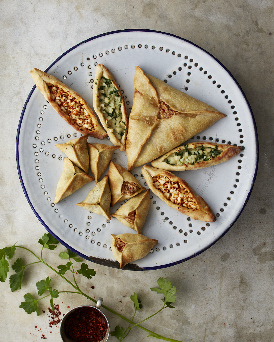 Lebanese fatayer with spinach and labneh fillings