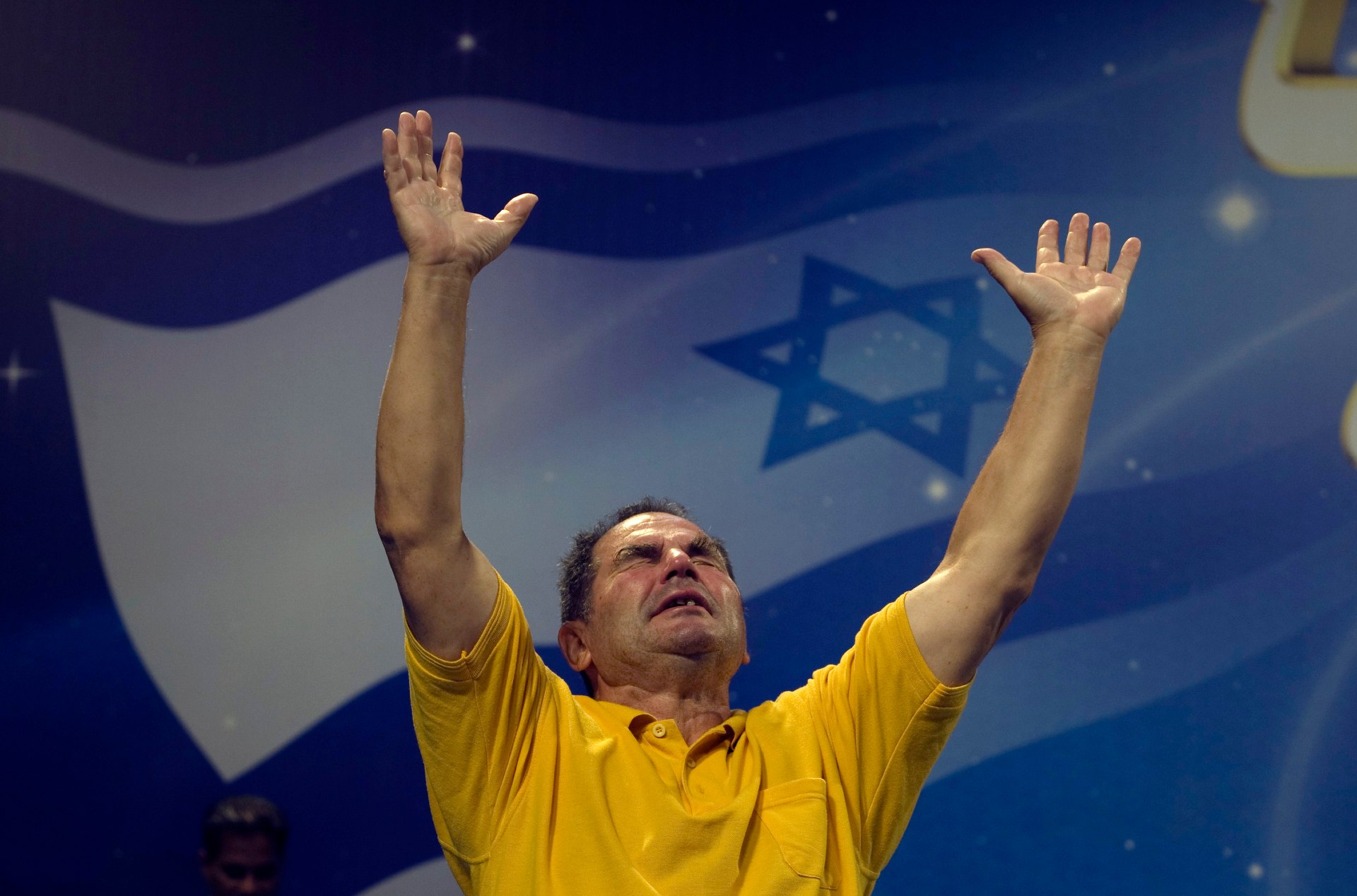 A Christian worshipper prays during an evangelical rally in Jerusalem (Reuters)