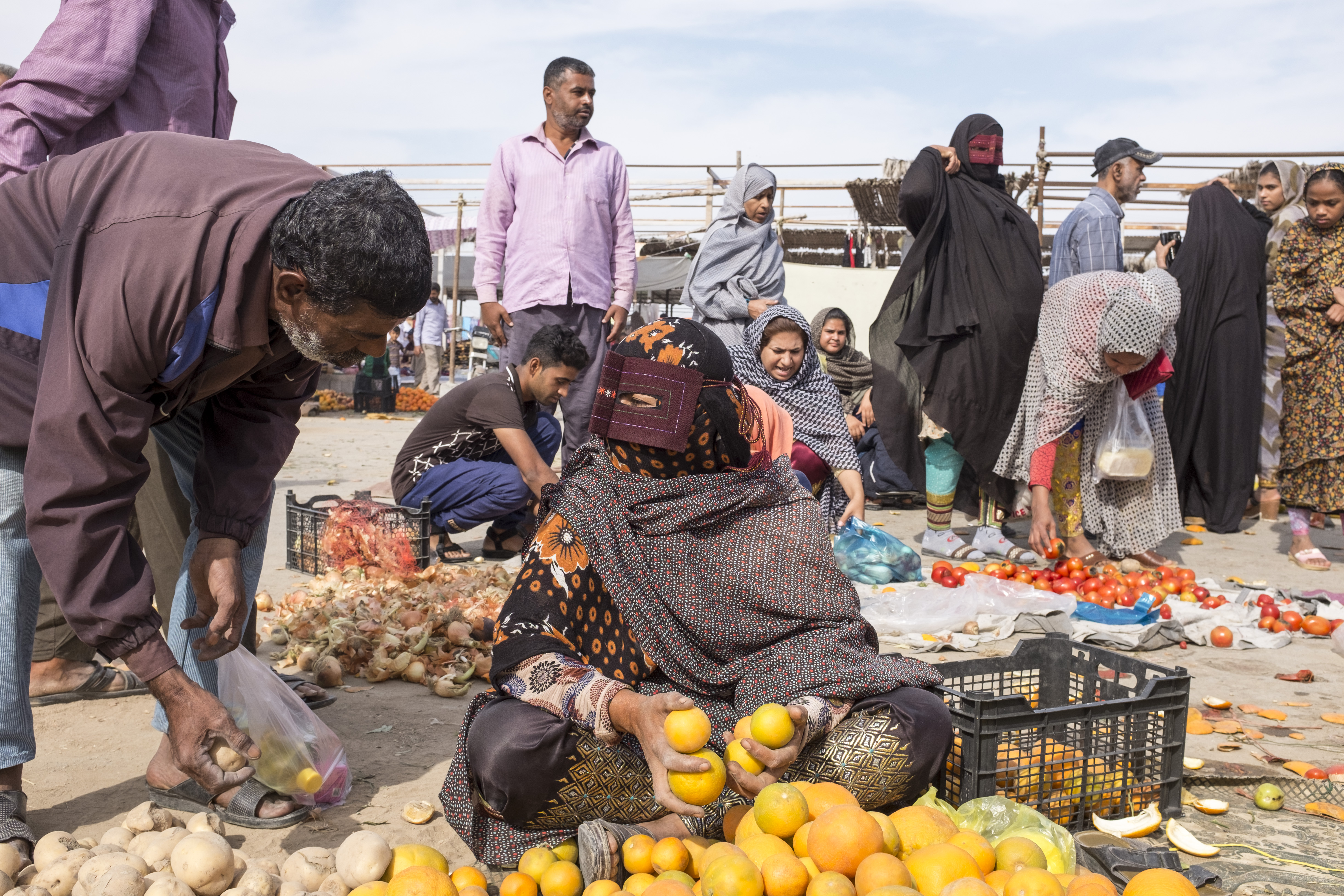 The women come from across Hormozgan Province to both buy and sell anything and everything, from embroidered trousers and fabrics to essentials such as vegetables and fruit (MEE)