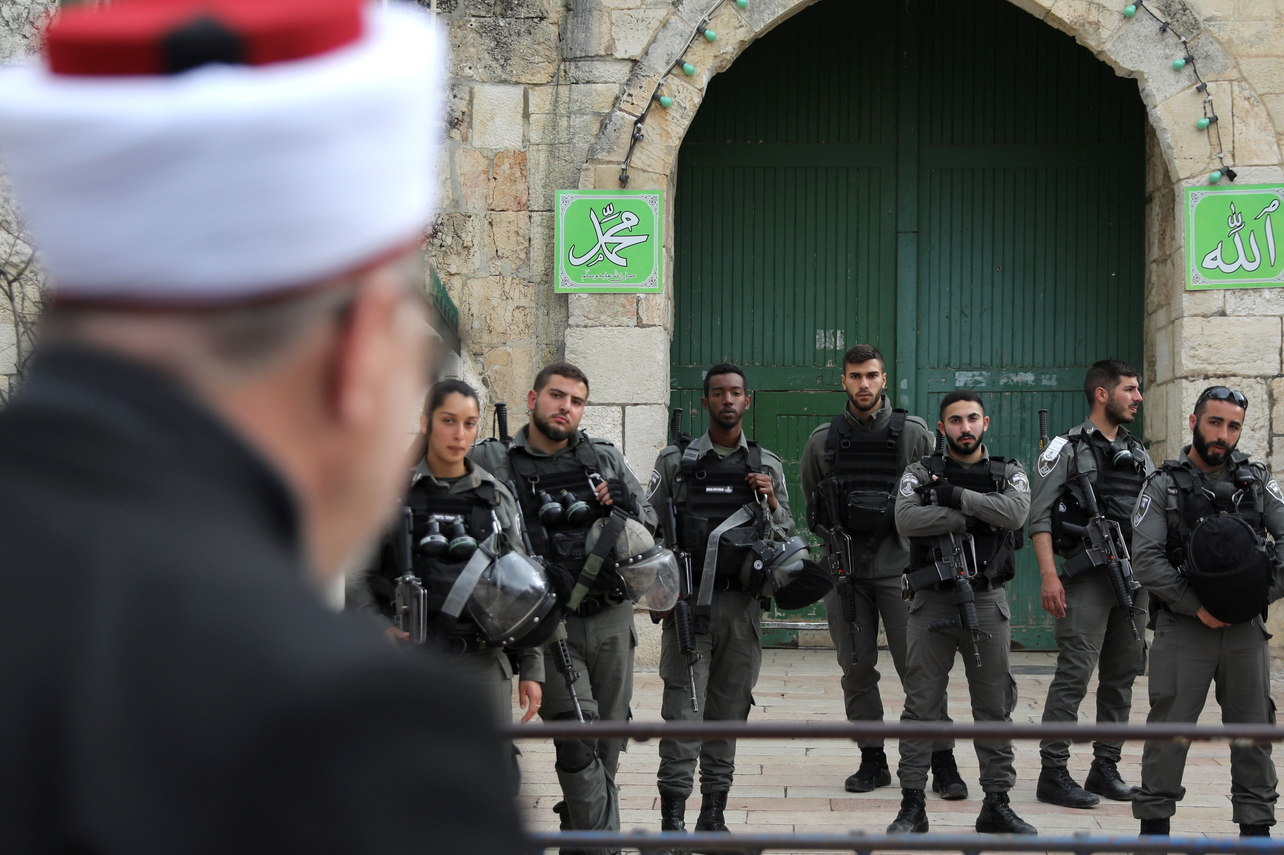Israeli border police stand guard near the entrance door leading to the compound housing al-Aqsa Mosque in Jerusalem's Old City March 12, 2019. REUTERS