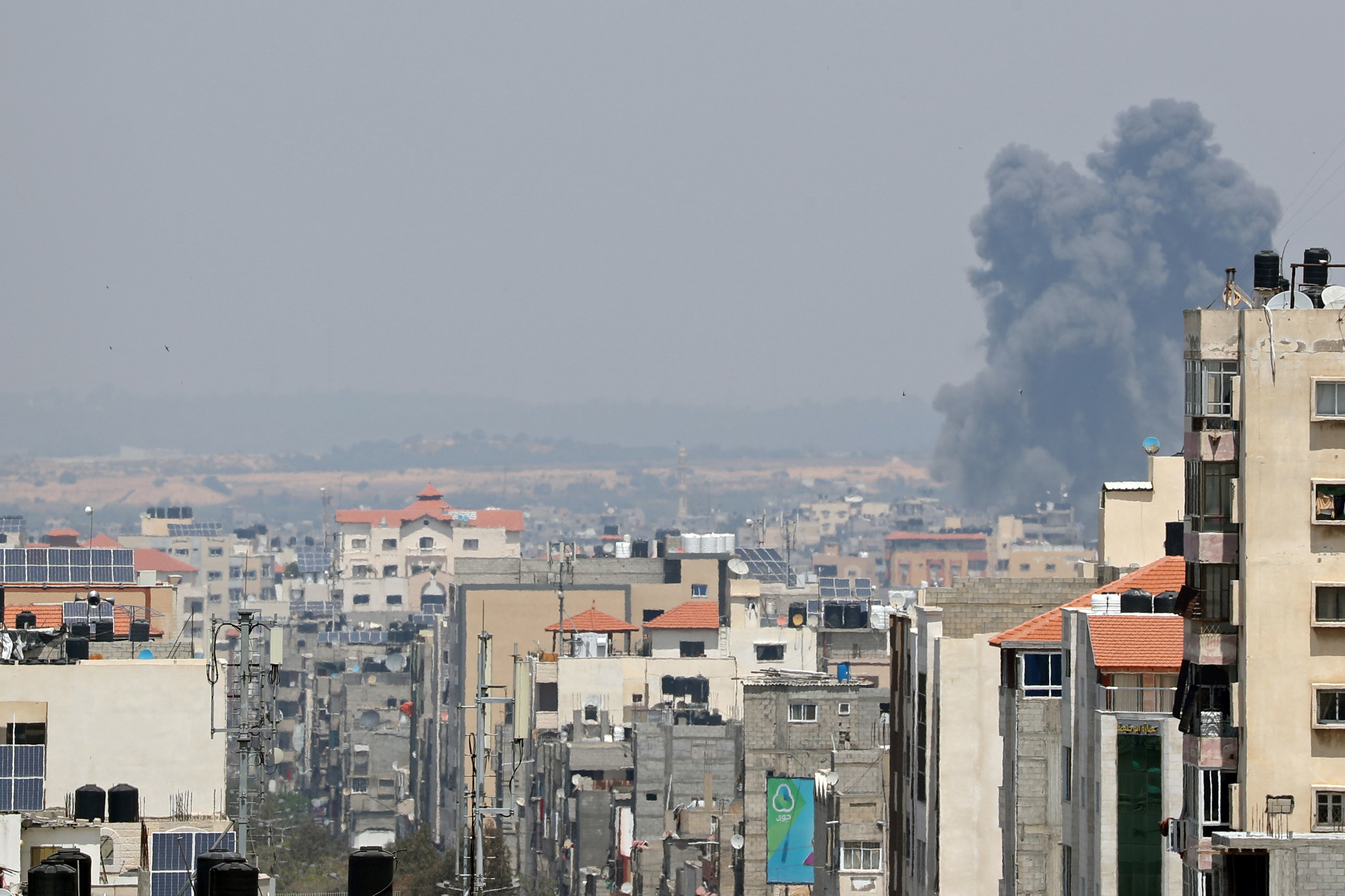 Smoke rises following an Israeli air strike in Gaza (Reuters)