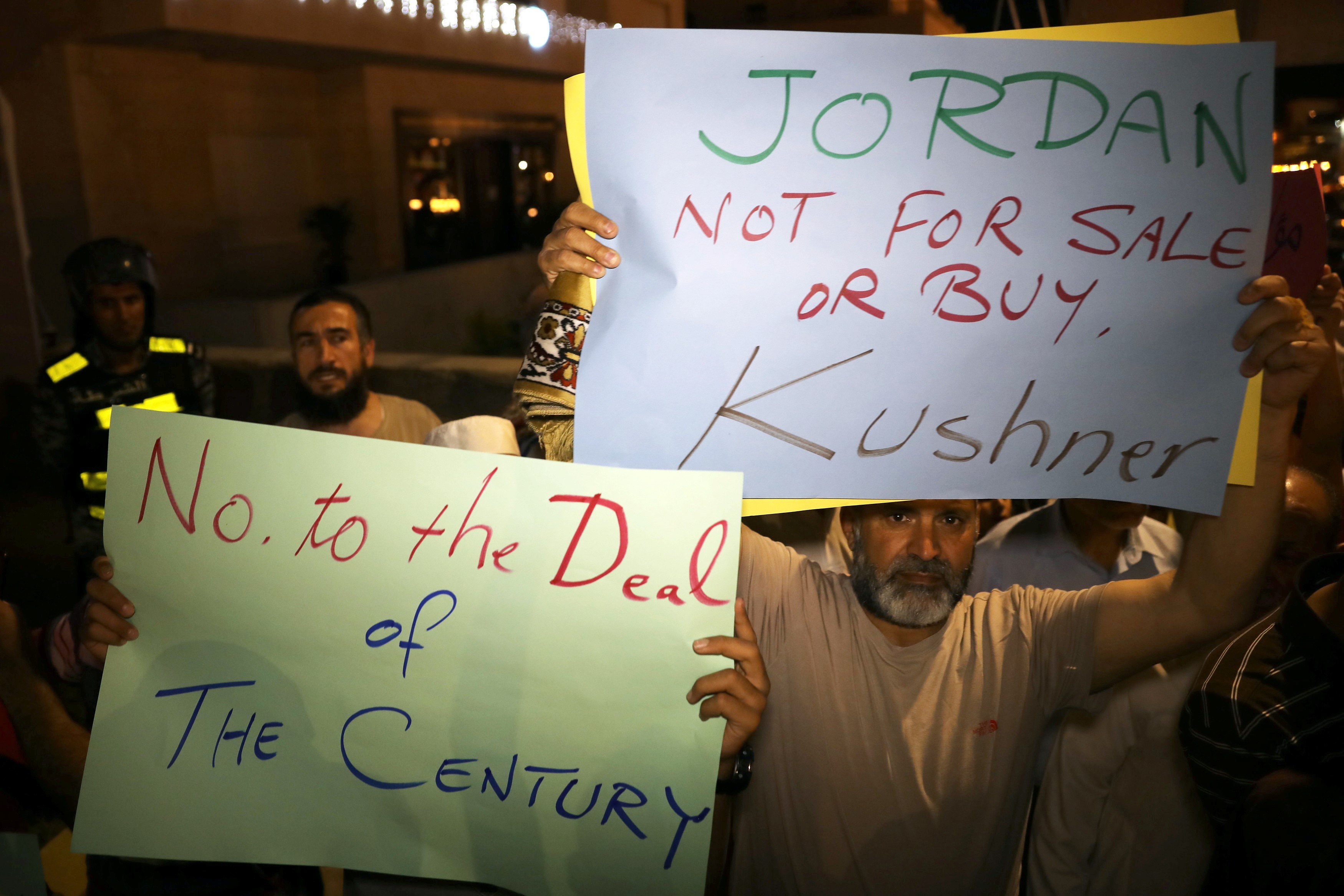 Members of Muslim Brotherhood take part in a sit-in against Kushner's visit to Jordan, near the US Embassy in Amman on 28 May, 2019 (Reuters)