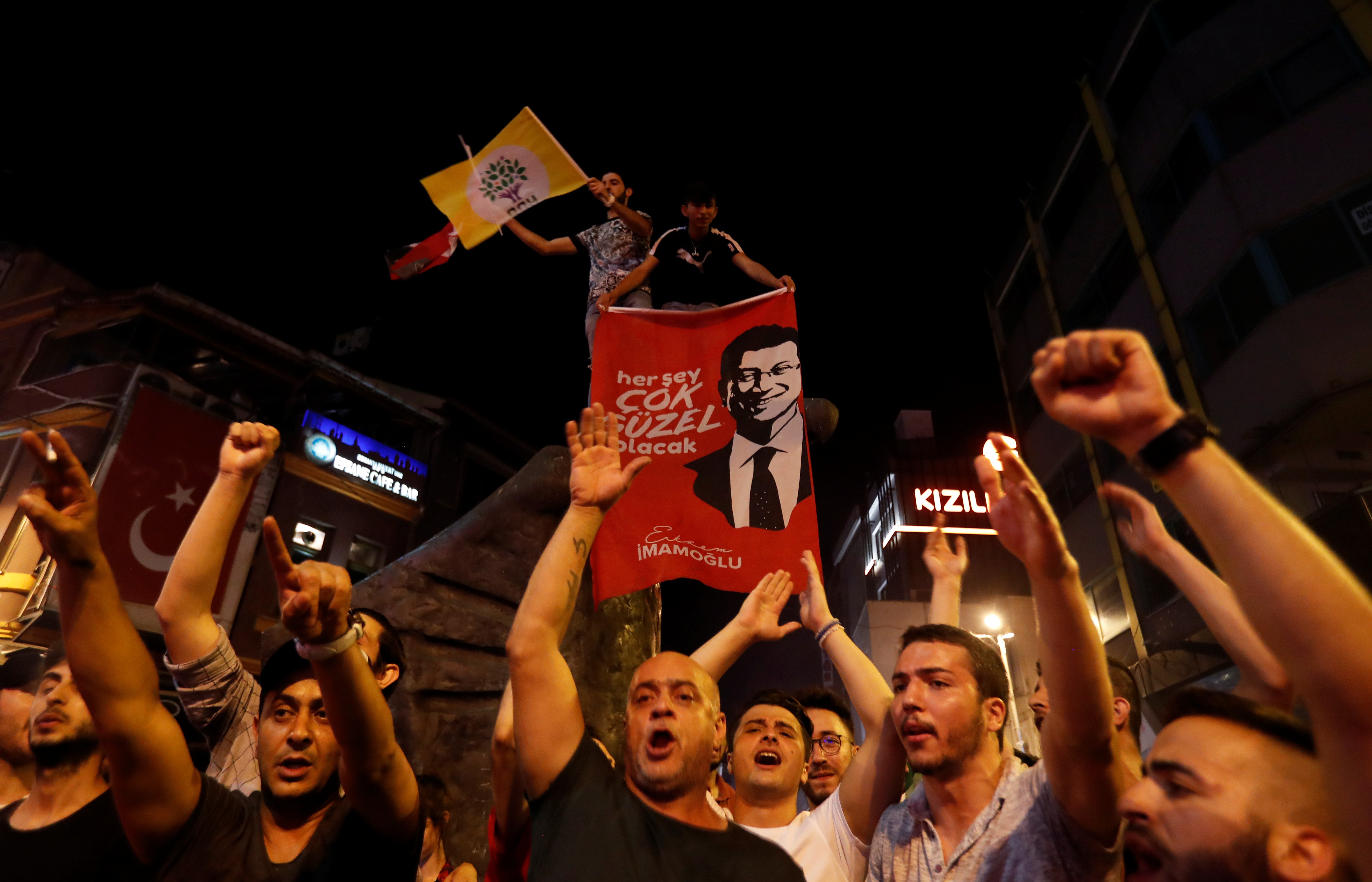 Supporters of Ekrem Imamoglu celebrate his election victory in Istanbul, Turkey, 23 June (Reuters)