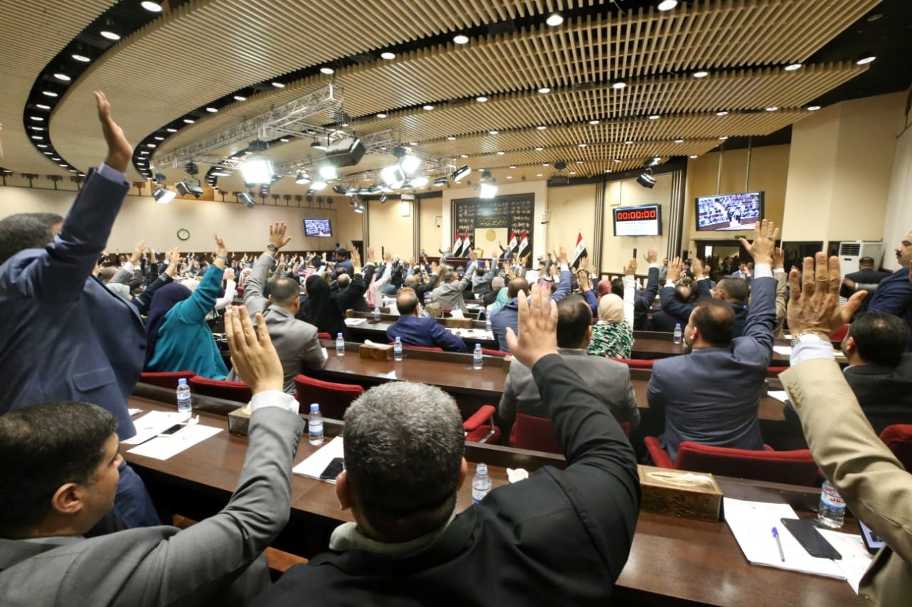 Members of the Iraqi parliament on 24 June (Reuters)