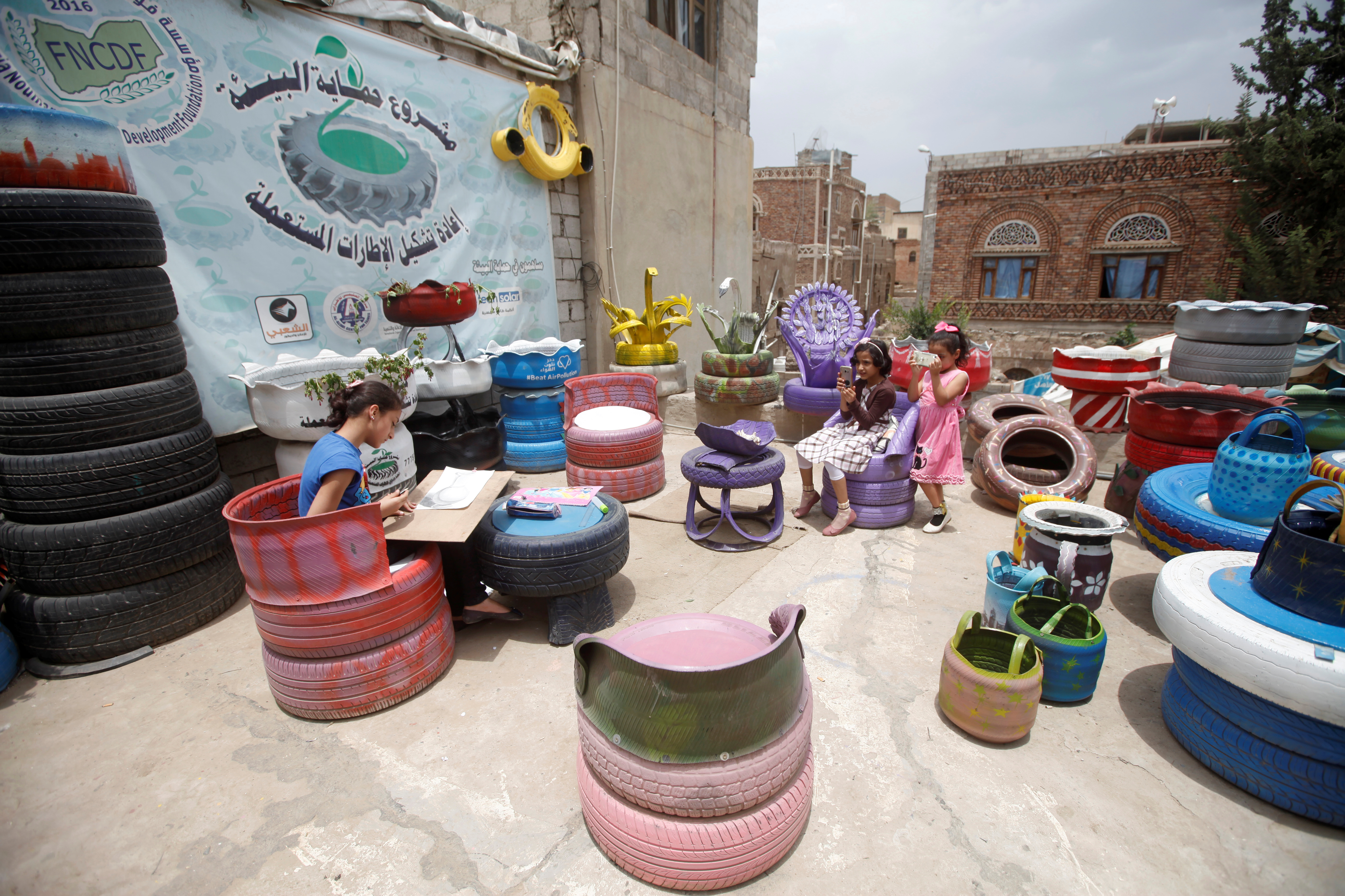 Colourful household furniture made from recycled tyres in Yemen
