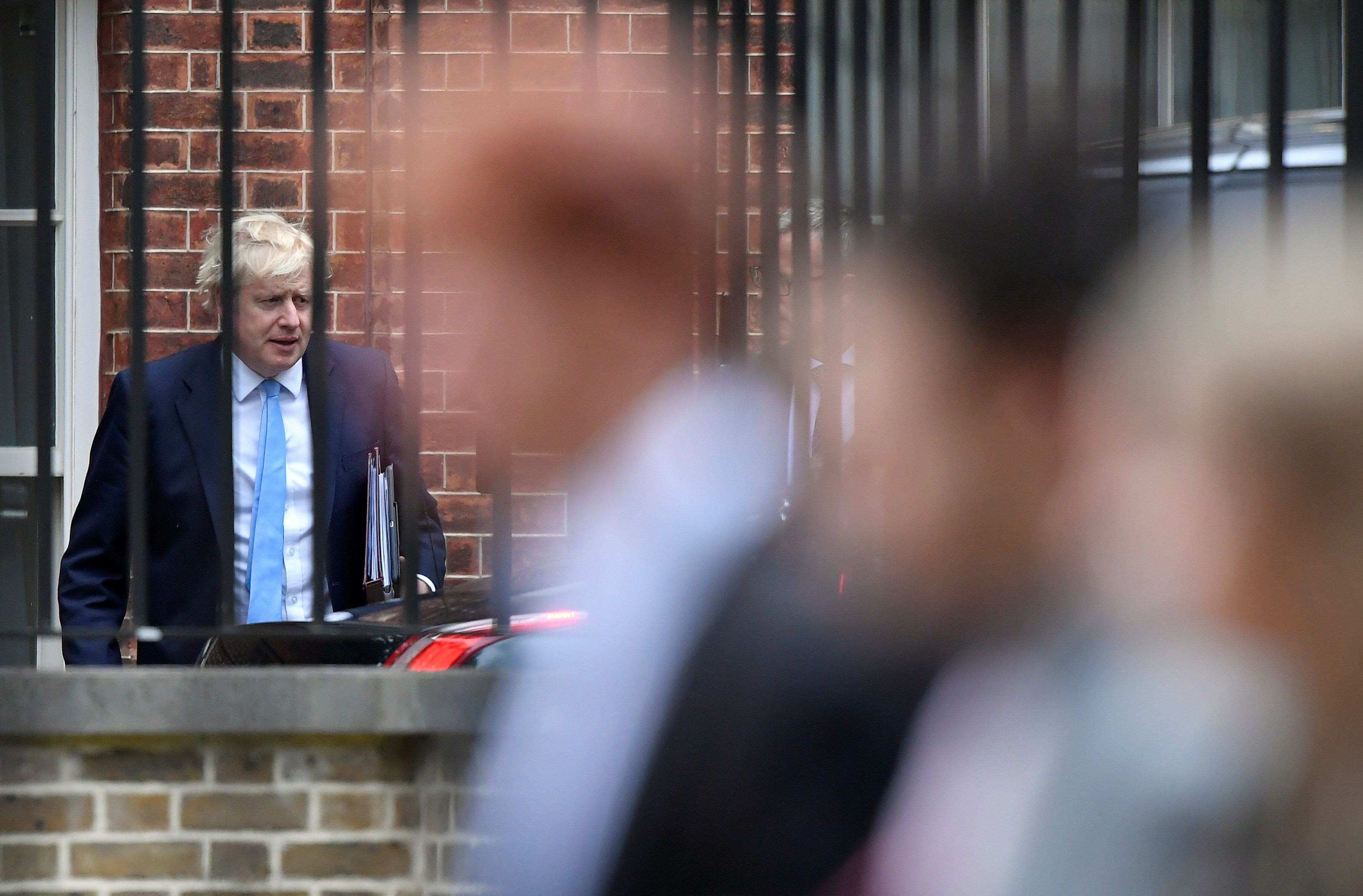 Britain's Prime Minister Boris Johnson leaves Downing Street from the rear entrance door, in London, Britain on 9 September (Reuters)