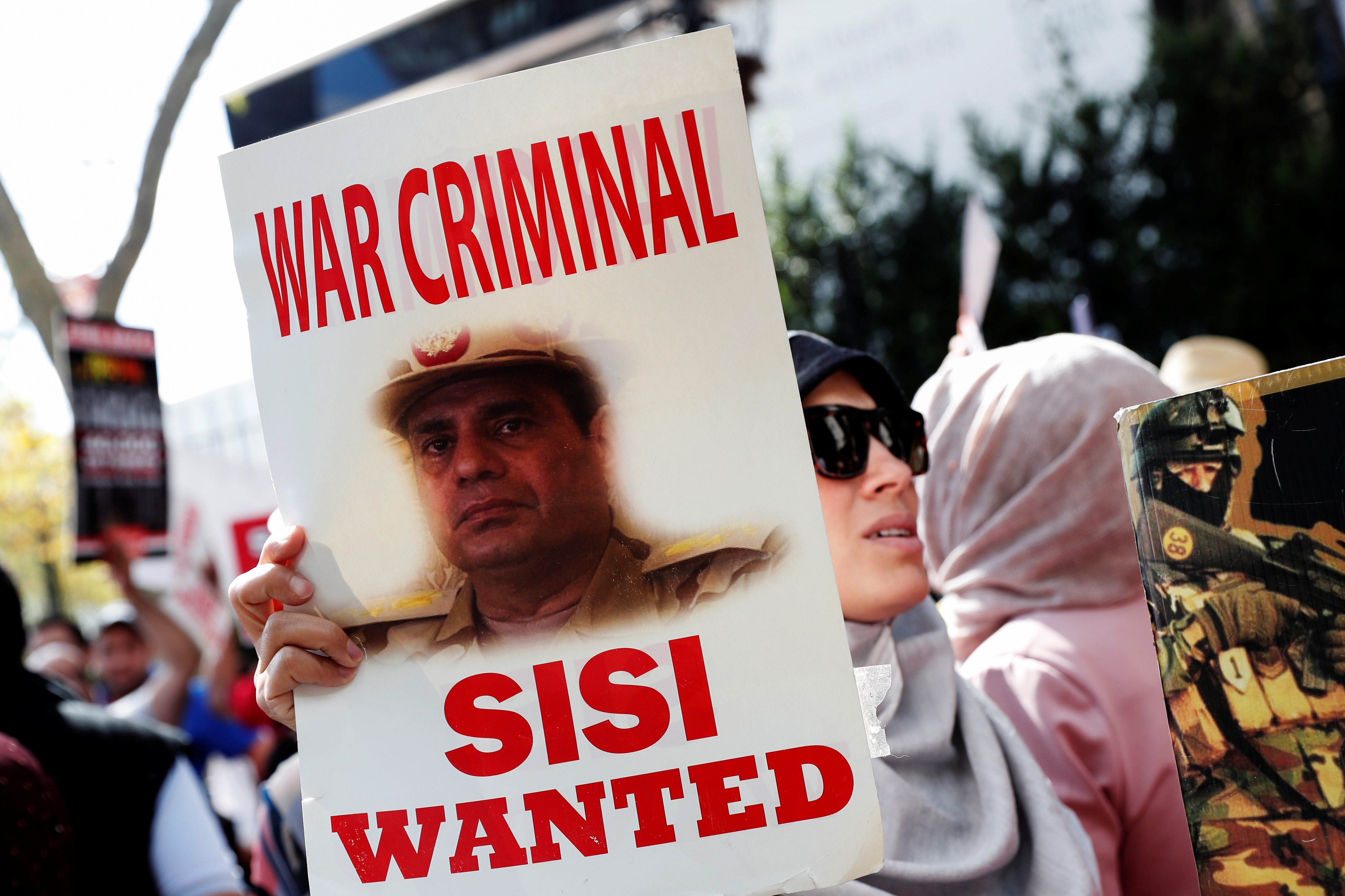 Demonstrators rally against Egyptian President Abdel Fattah al-Sisi outside the U.N. headquarters in New York on 24 September (Reuters)