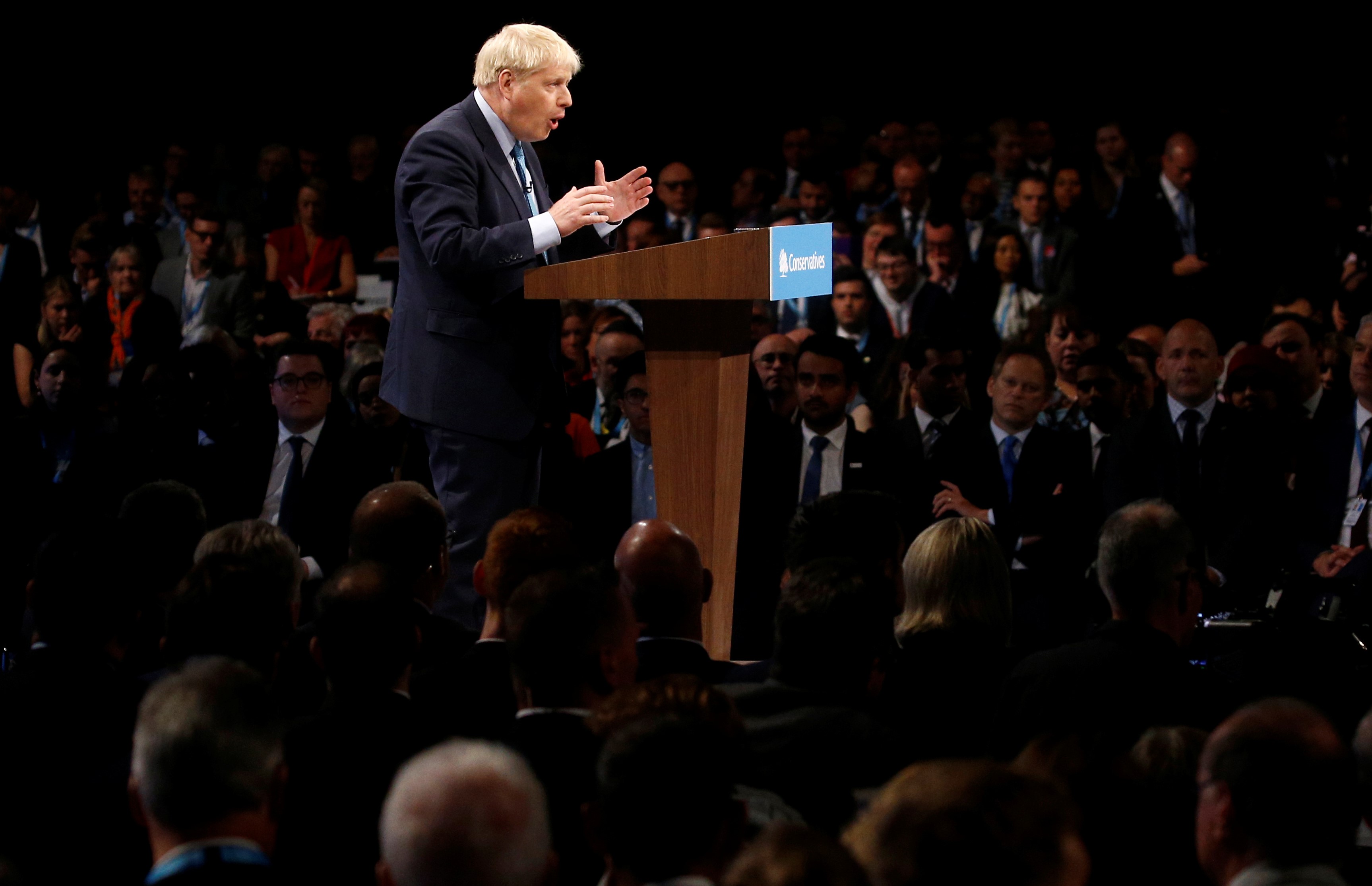Britain's Prime Minister Boris Johnson gives a closing speech at the Conservative Party annual conference in Manchester on 2 October 2019 (Reuters)