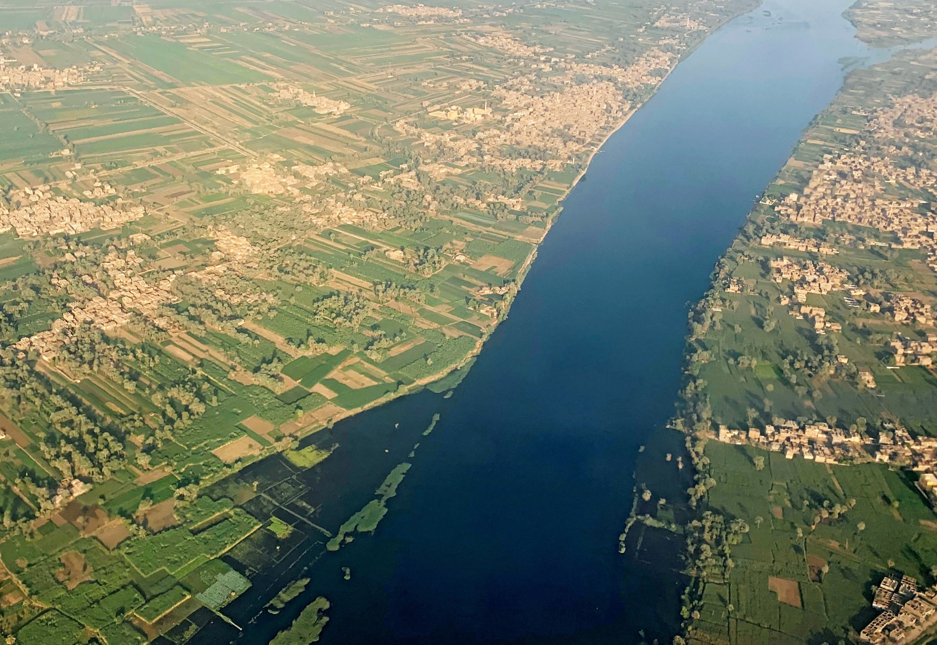 A general view of The Nile River, houses and agricultural land from the window of an airplane in Luxor, Egypt on 9 October 9 (Reuters)