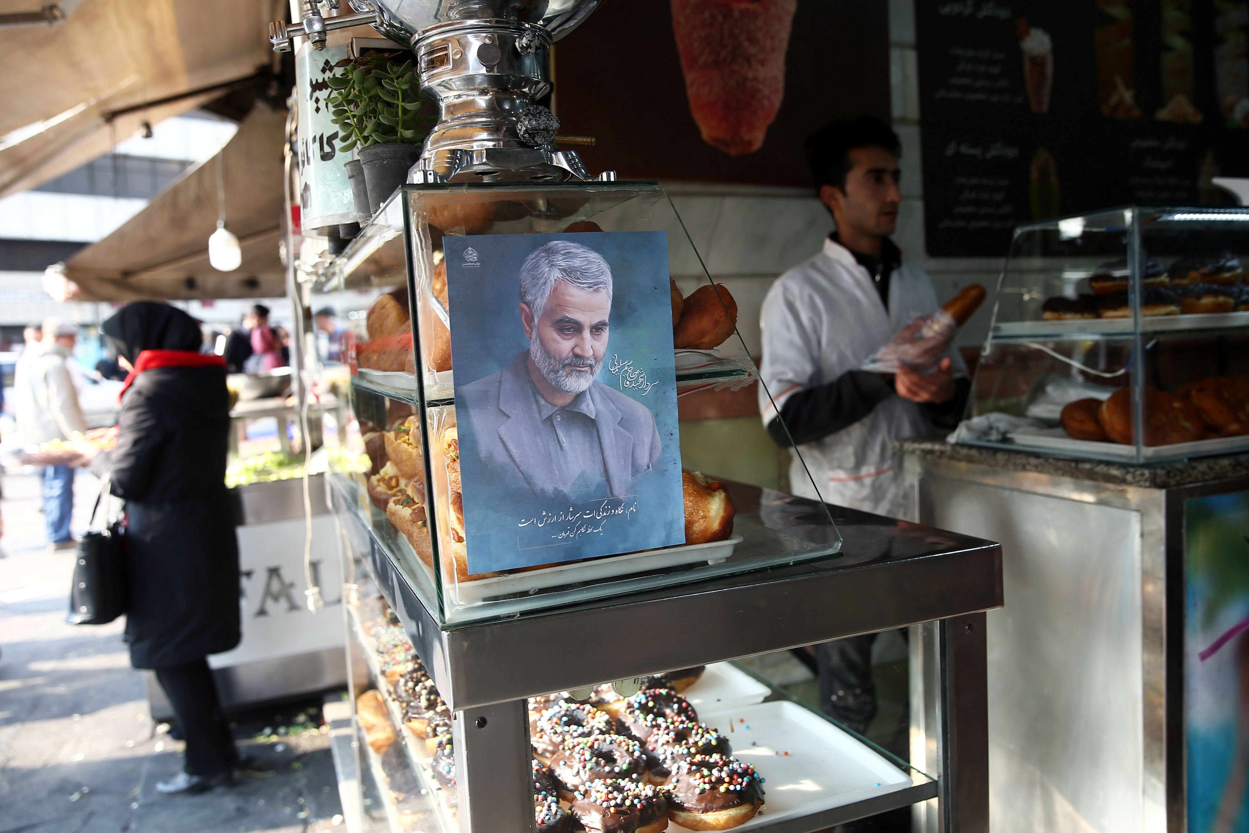 A picture of Iranian Major-General Qassem Soleimani is seen at a confectionery shop in Tehran (Reuters)