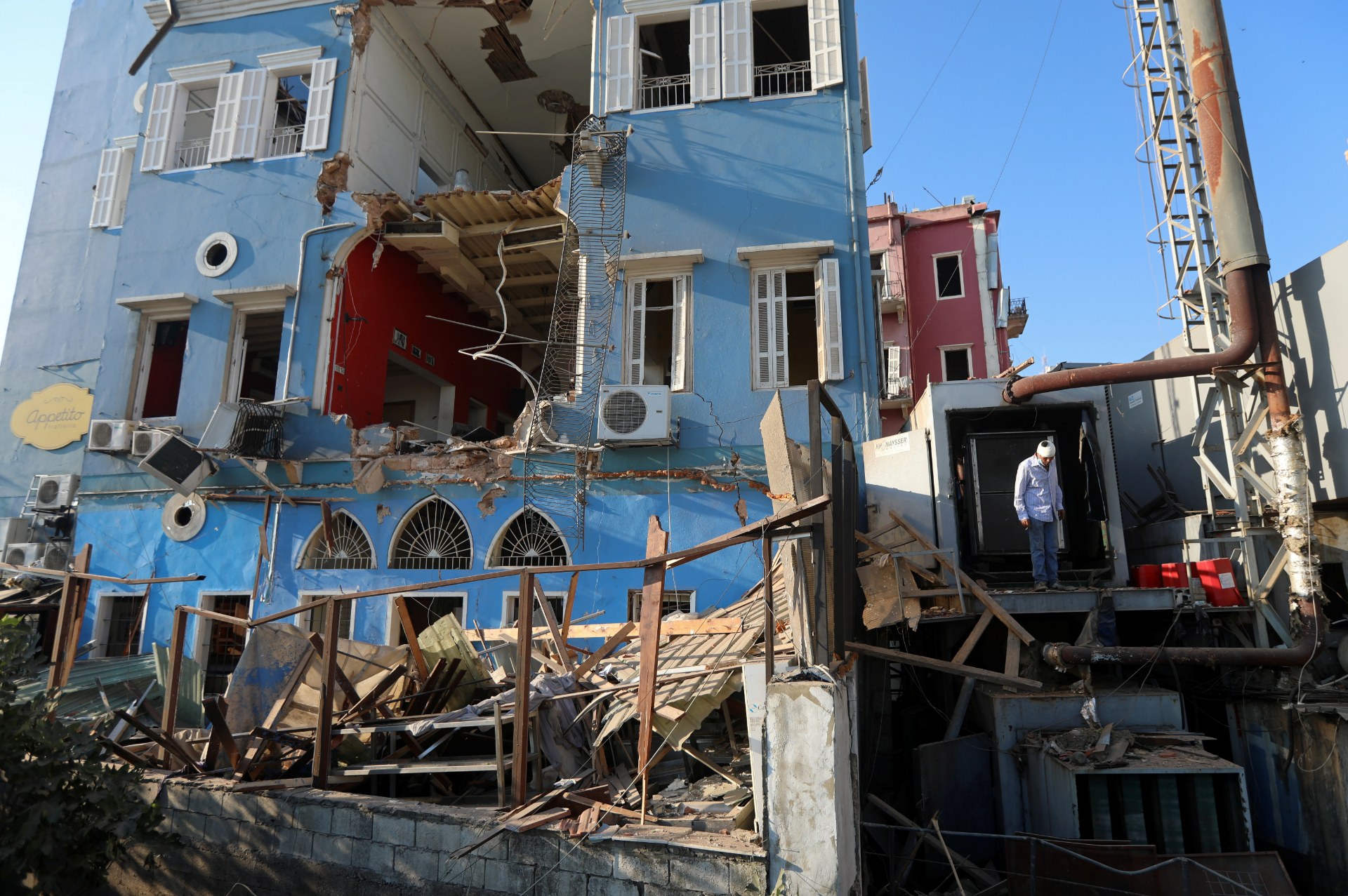 A man inspects the damage following Tuesday's blast in Beirut's port area (Reuters)